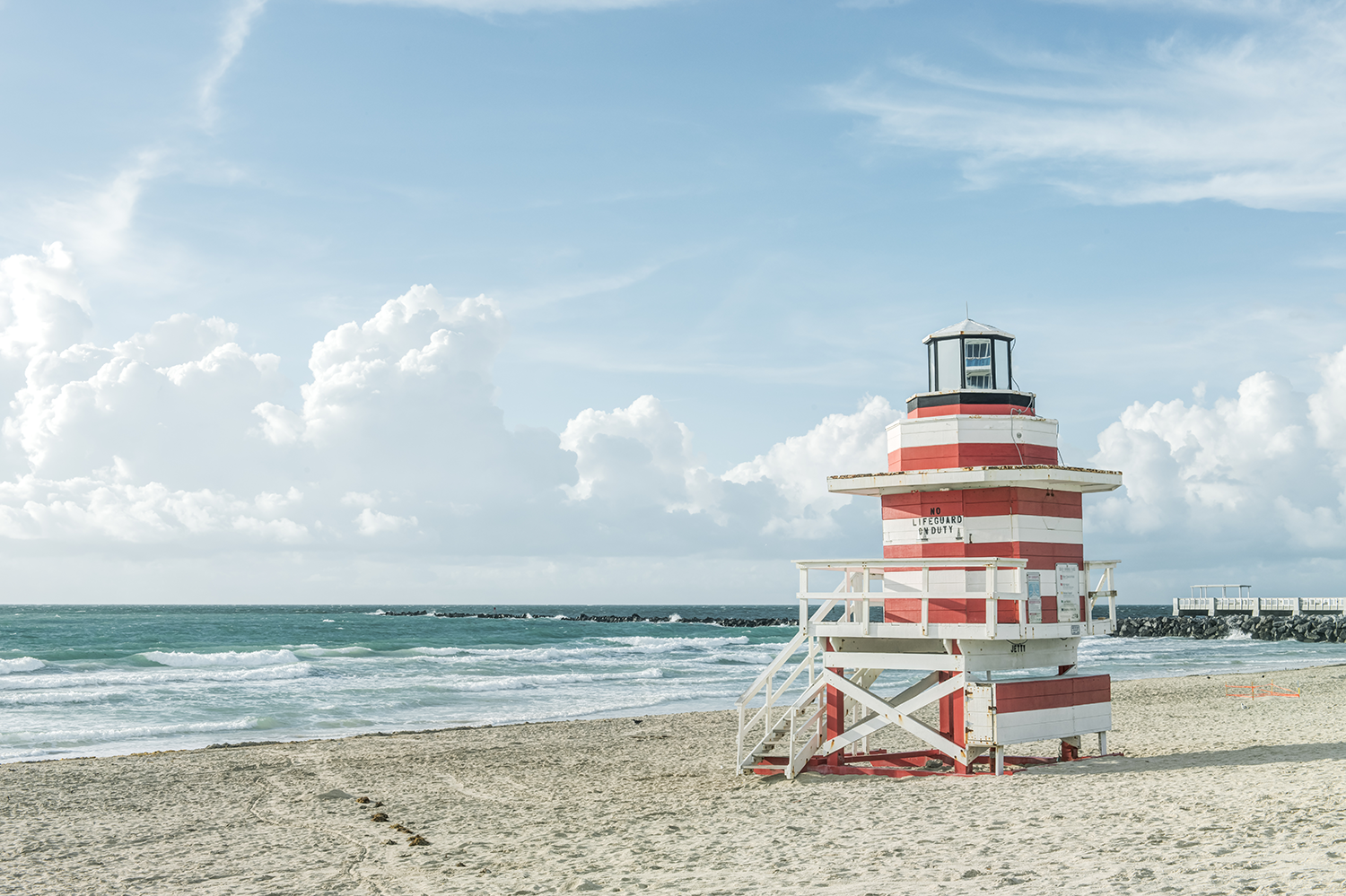 Lifeguard tower by the ocean representing clarity through psychoeducational testing