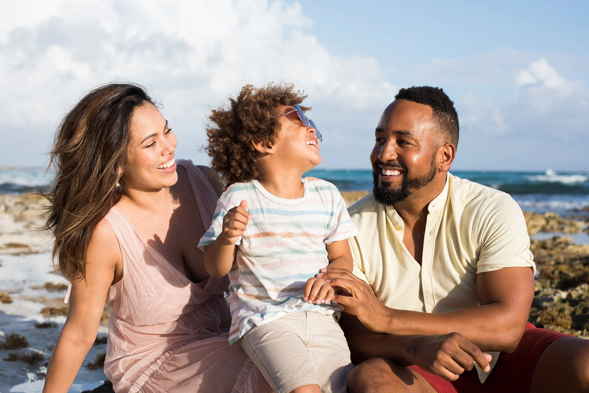 Family at the beach representing individual and family therapy in Norfolk, VA
