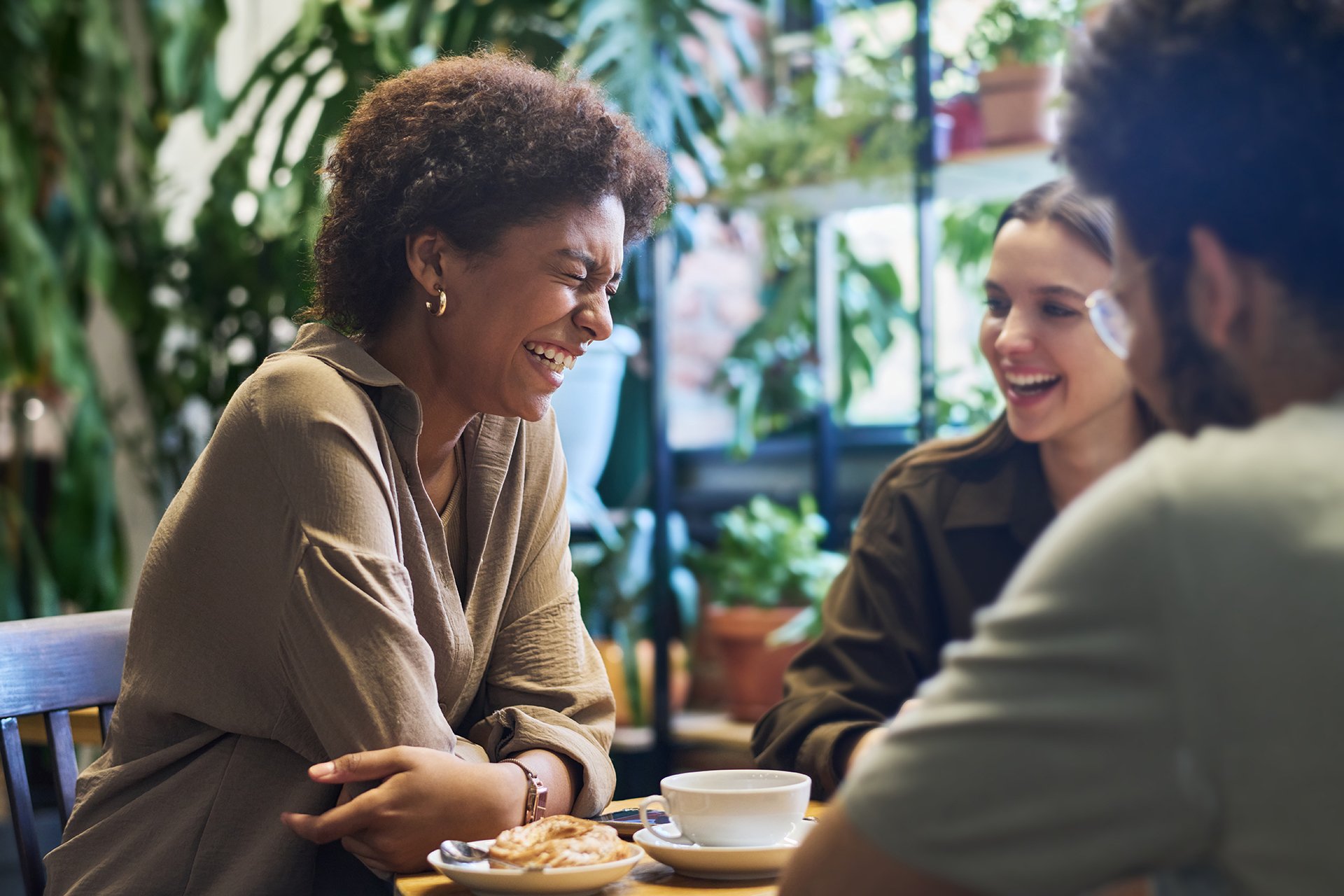 Professionals in conversation representing collaborative clinical consultation