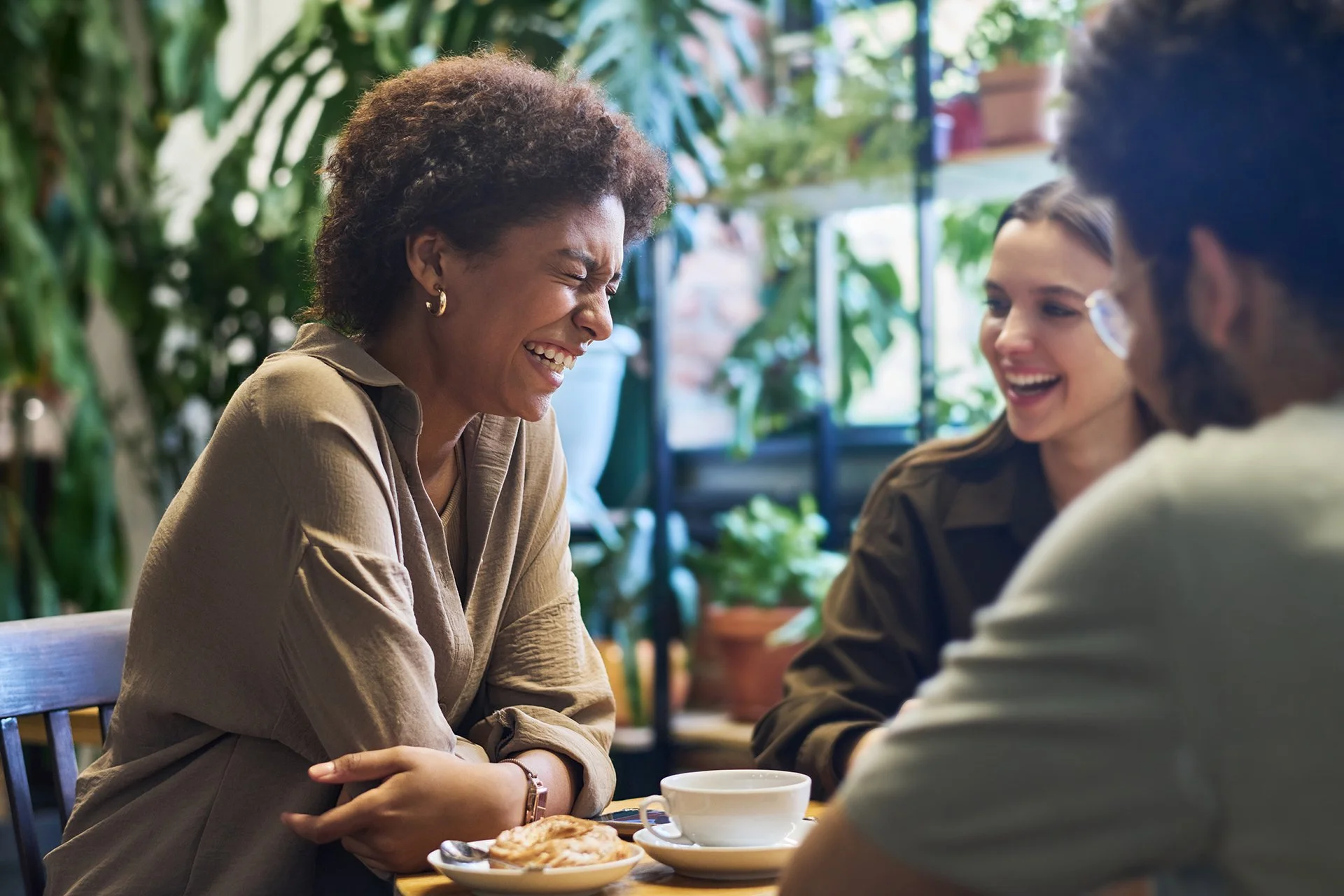 Professionals in conversation representing trauma-informed mental health care leadership