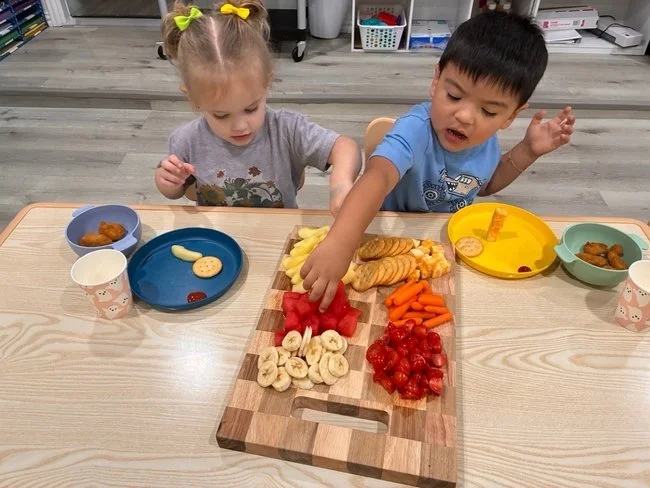 mateo and riann eating.jpg