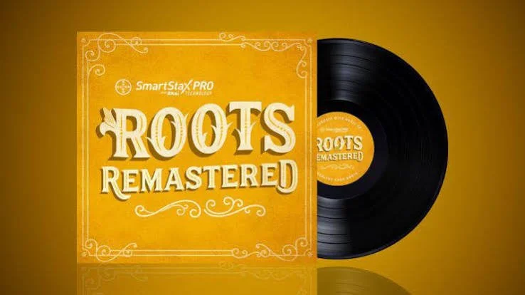 A vinyl record and its cover art titled 'Roots Remastered' by SmartStax PRO on a golden background.