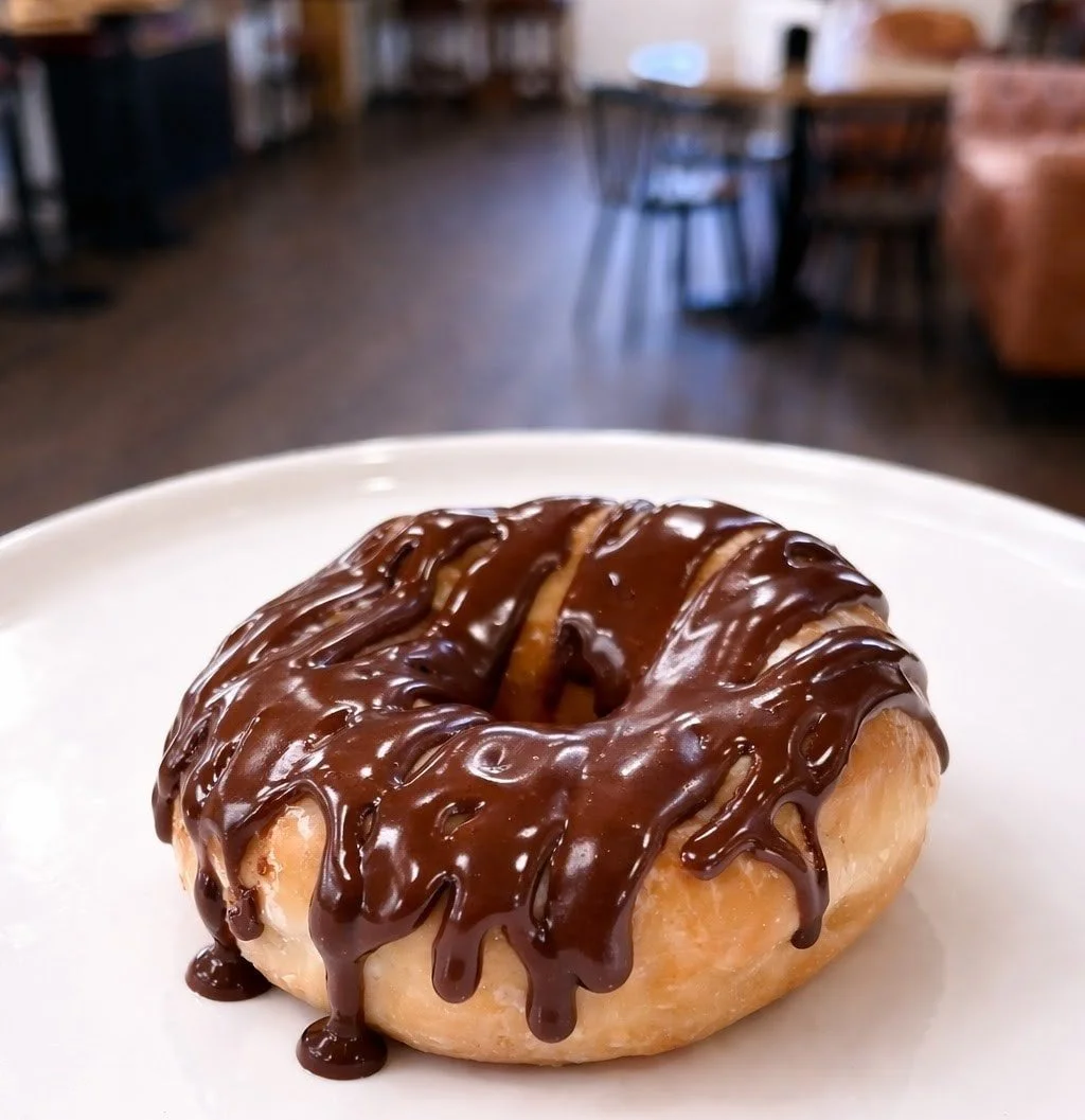 It's Friday - that means fresh glazed donuts! We have chocolate, strawberry, or plain glazed donuts available. Stop by and see us today! 💖🤍🤎