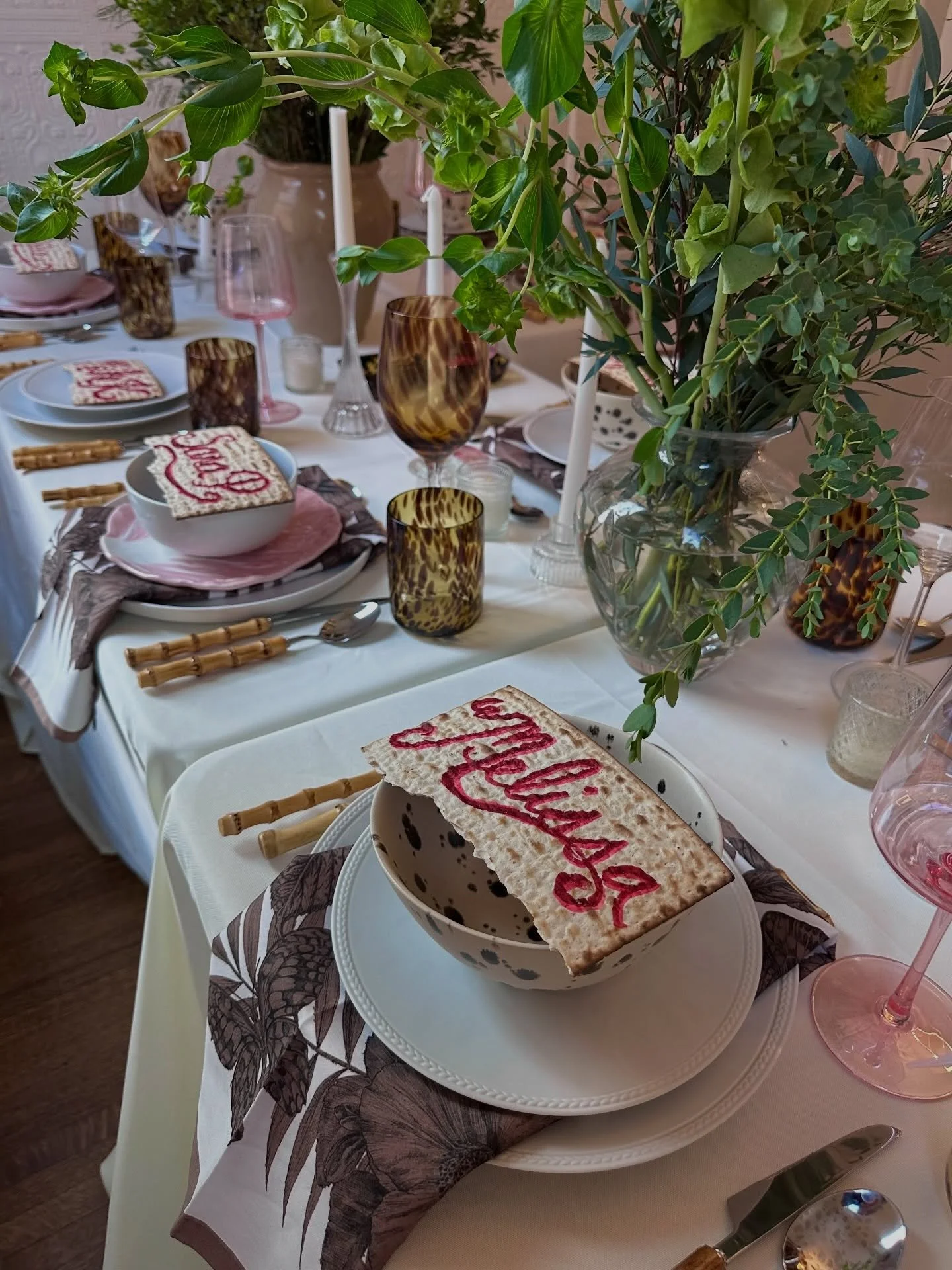 Passover 2026 🤍. 40 people (!). Lots of friends, lots of food, lots of vibes, lots of love, &amp; lots of little Four Questions readers this year 🥹. Endlessly grateful for everyone in our lives! 

Menu:
- Matzo ball soup
- Hummus with grilled grape