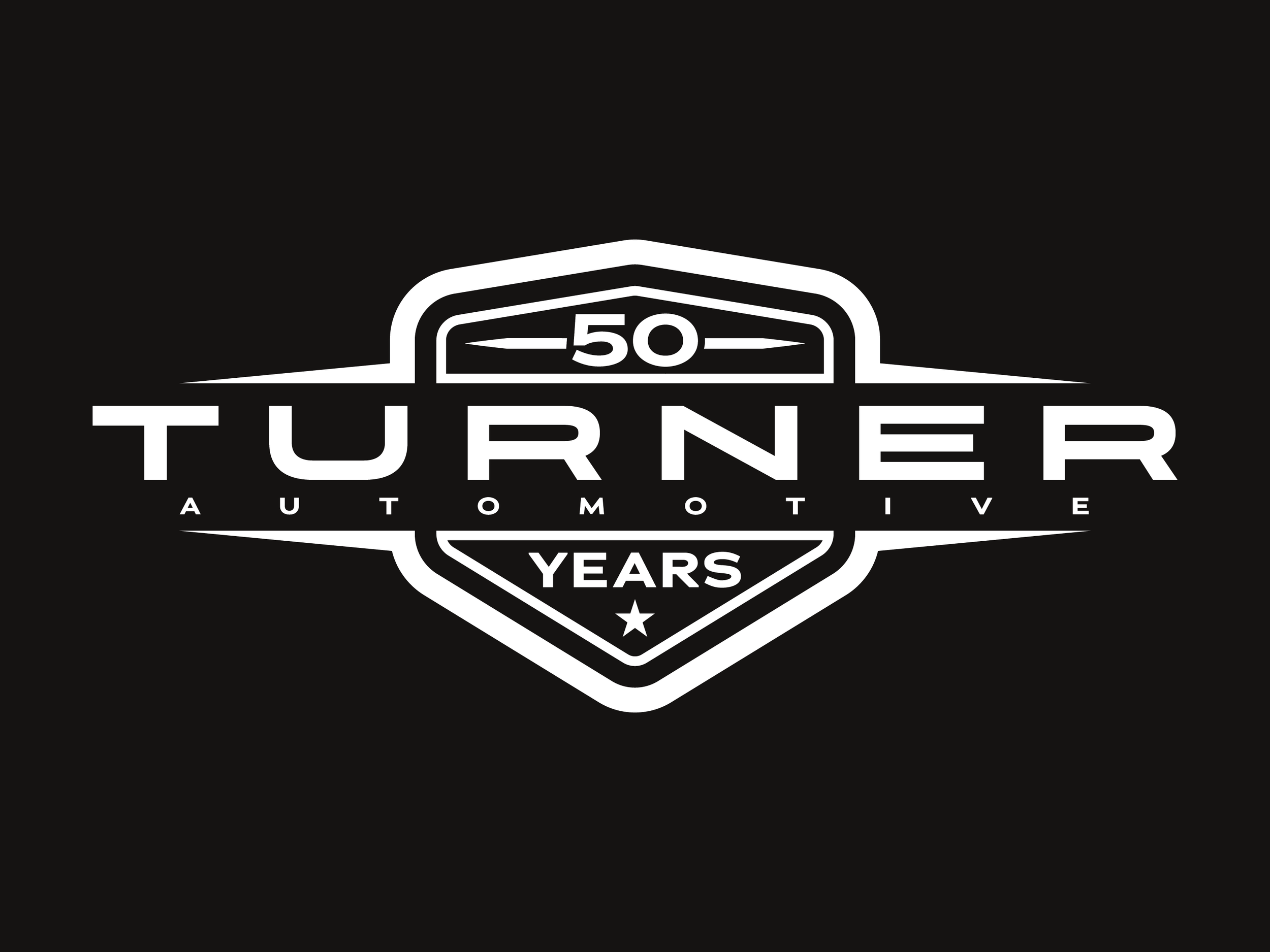Celebrating 50 years of Turner Automotive with a black and white logo featuring a shield design.