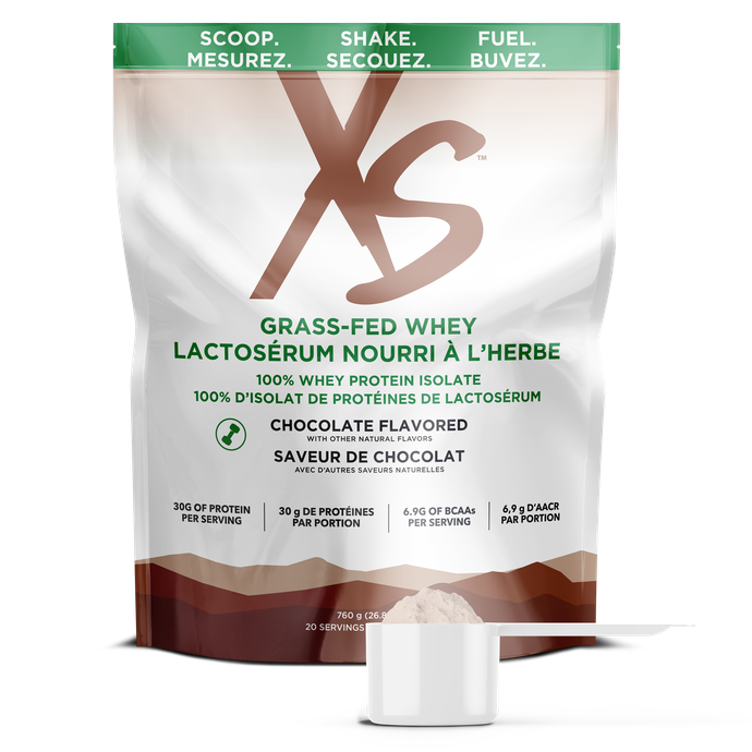 A package of grass-fed whey protein isolate in chocolate flavor. The bag is white with green and brown accents, featuring the brand logo, nutritional information, and a scoop of protein powder at the bottom.