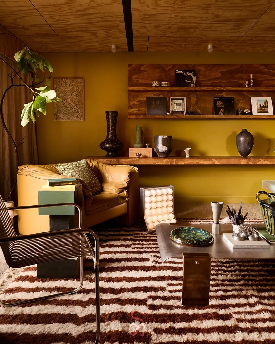 &bull;THE VIEW&bull; 

This room is the crescendo. The one where the collecting tipped into something orchestral. Feathers gathered on bush walks, ceramics traded between friends, woven pieces carrying memories. And yes&hellip; a hard-rubbish Simmons