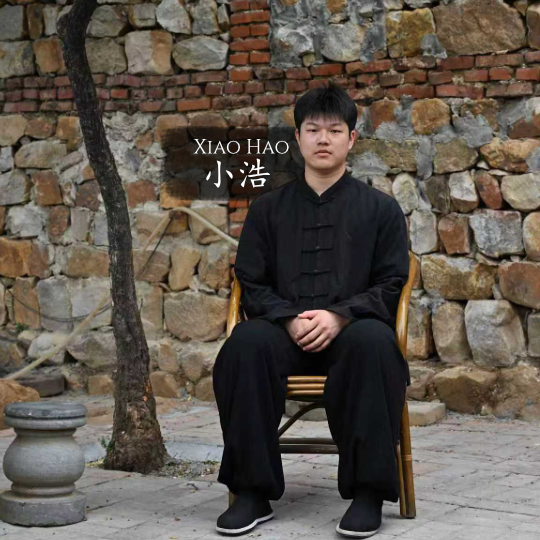 Xiao Hao Laoshi is twenty years old, six years in training. His movement is already fluid and composed well beyond his years. Quiet, humble, easy to be around.