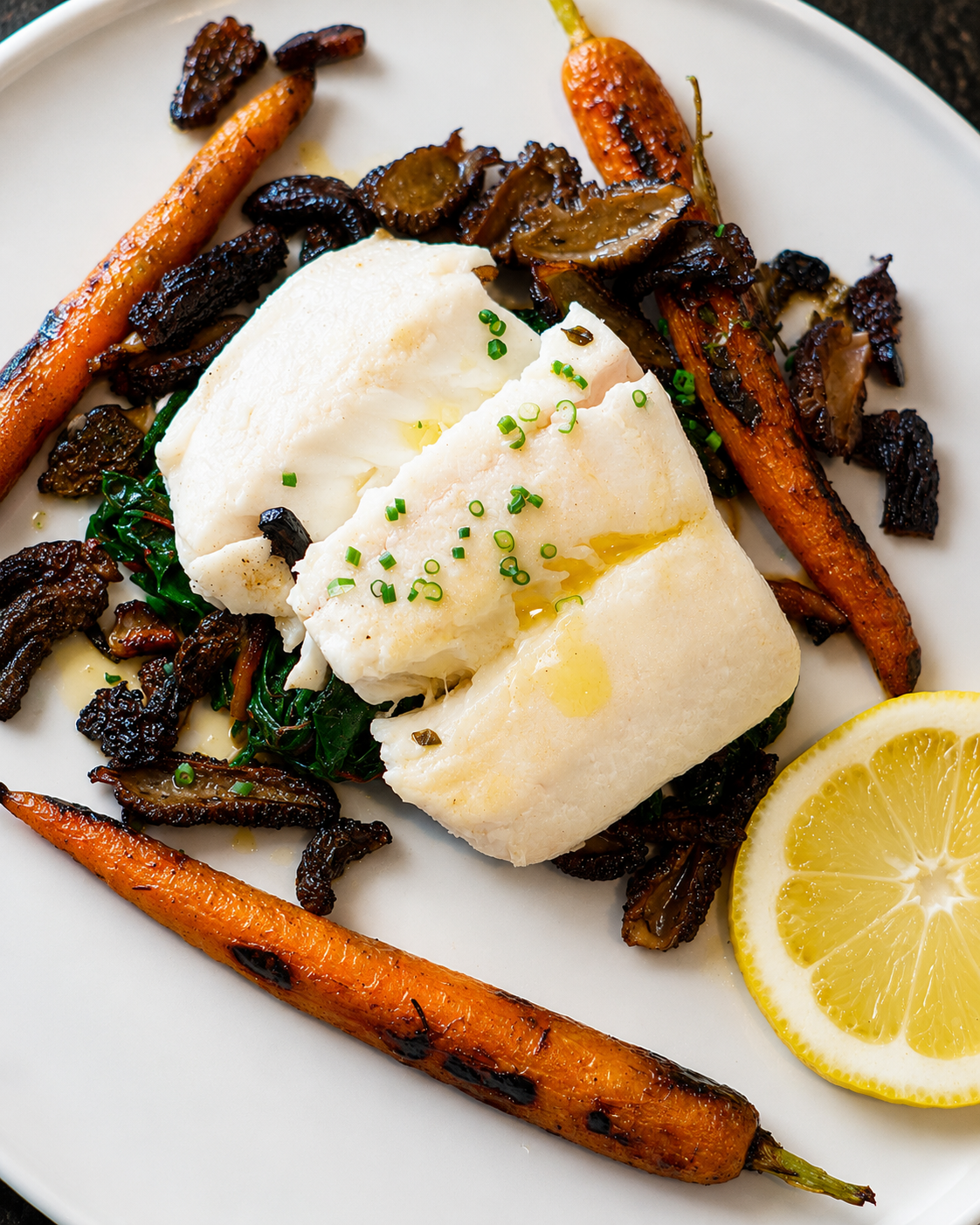 Butter-Poached Oregon Halibut with Morels, Charred Carrots &amp; Swiss Chard