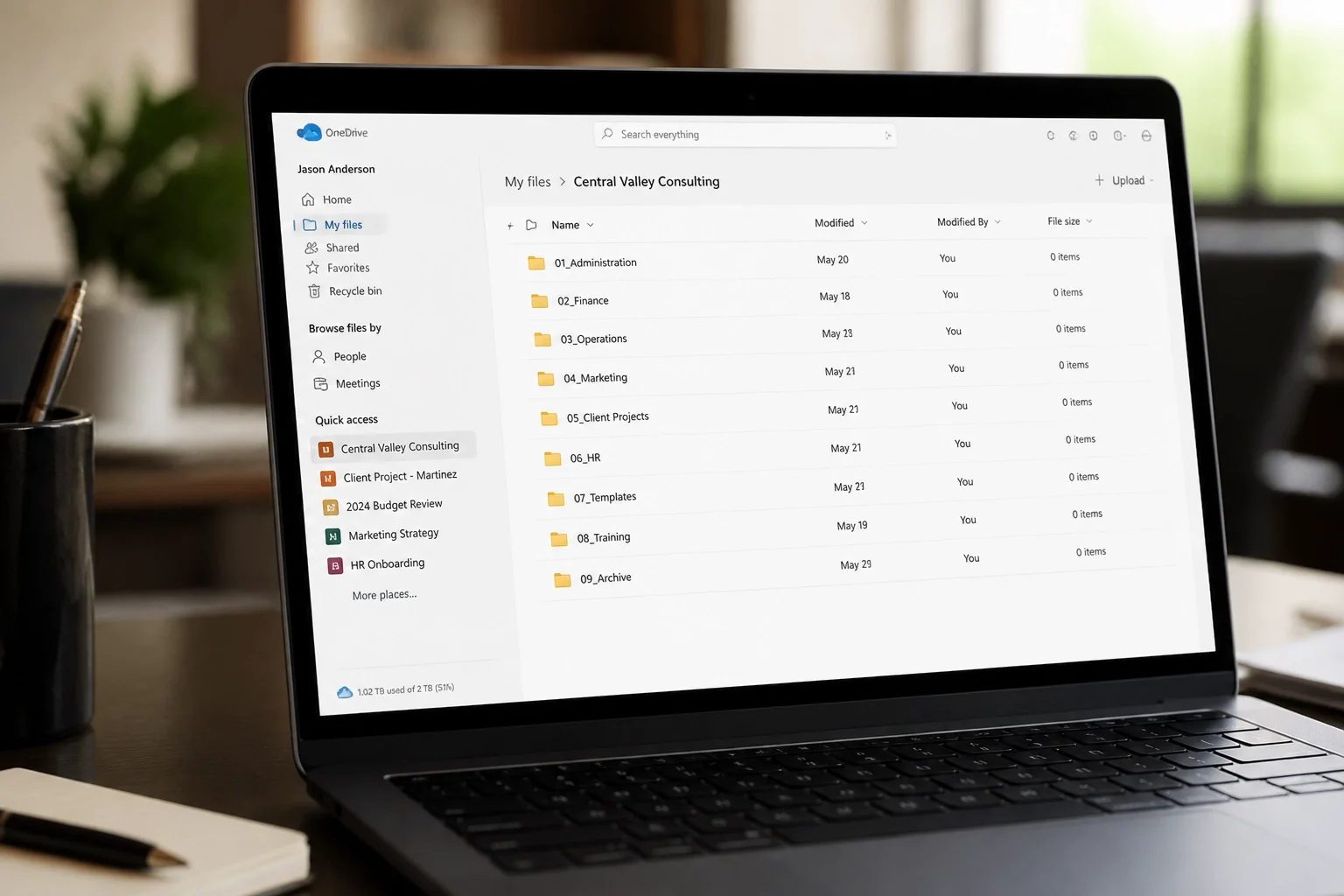 Perfectly synced OneDrive business folders on a laptop screen for a professional setup in the Central Valley.