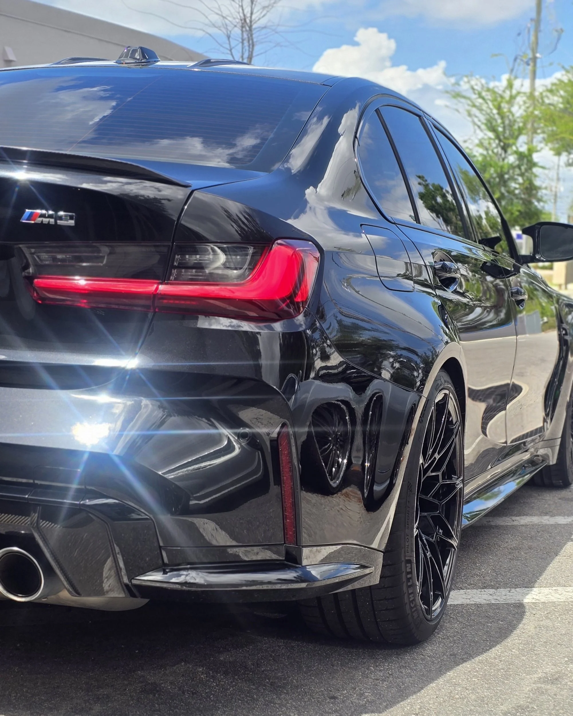 Black BMW M3 with premium ceramic coating and deep gloss finish at Miyagi Motorworks
