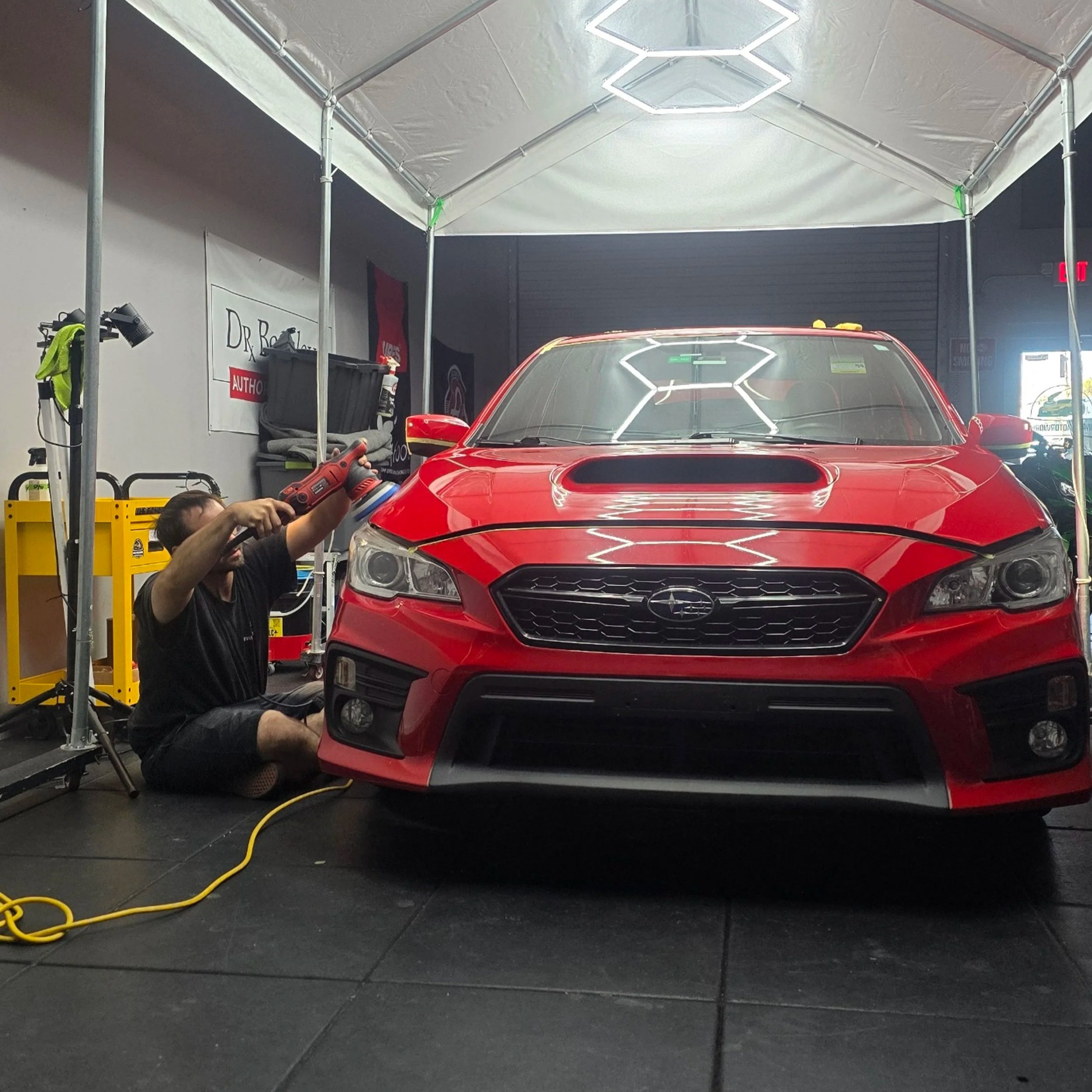 red subaru wrx getting paint correction and ceramic coating in largo, fl