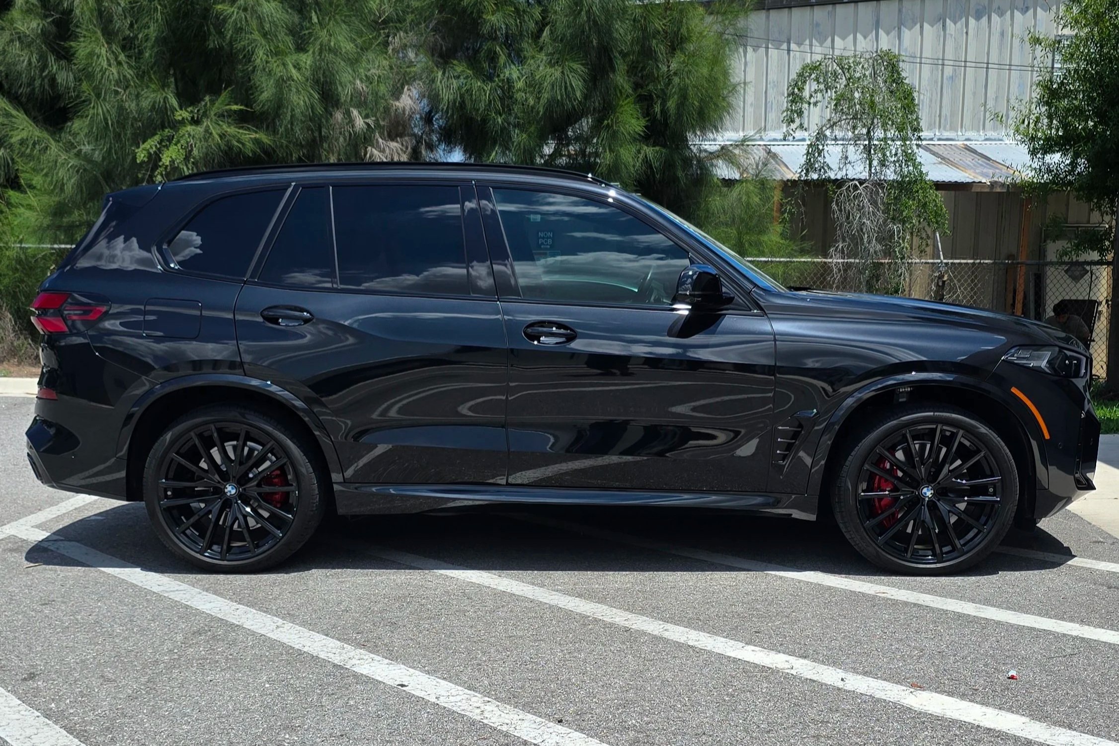 black m60i x5 bmw after polishing and ceramic coating in largo