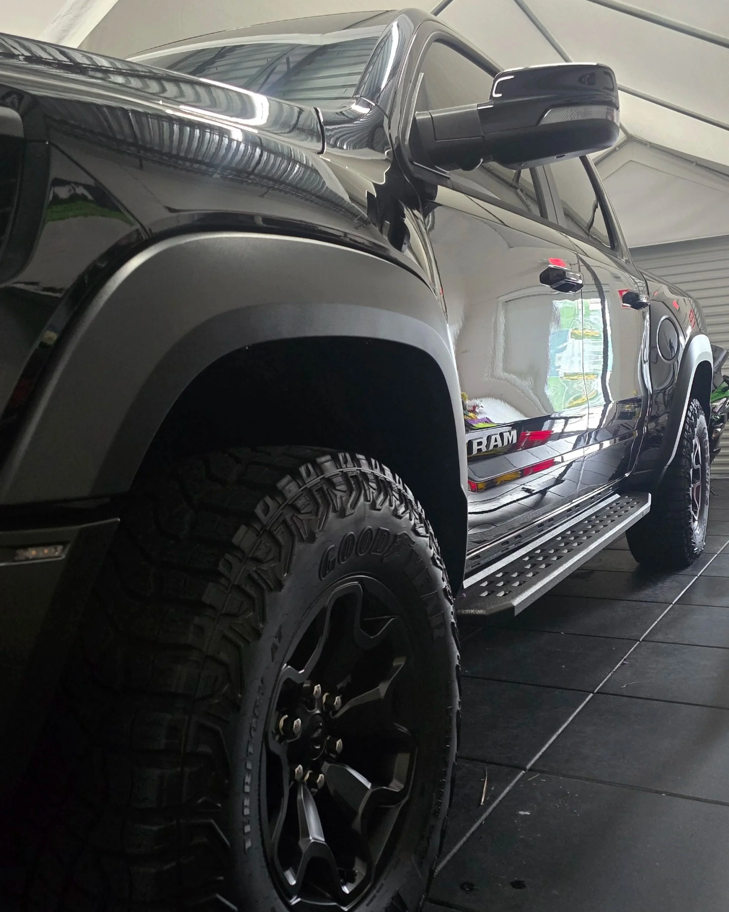 New Black Ram RHO after polishing and ceramic coating in the light tunnel inside shop