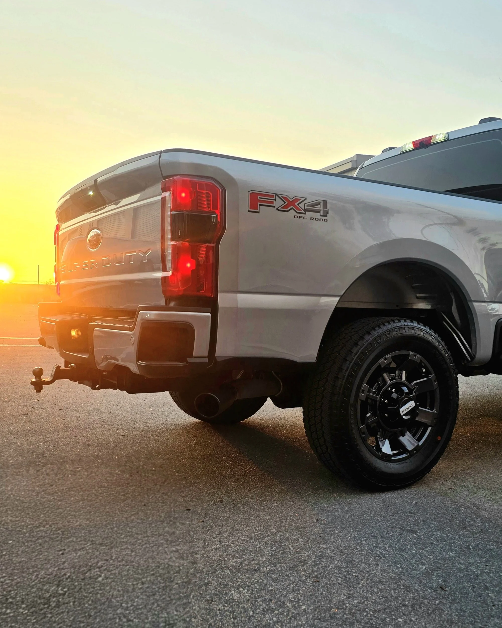 Silver Ford F-250 Super Duty with 7-year ceramic coating for durable shine and paint defense