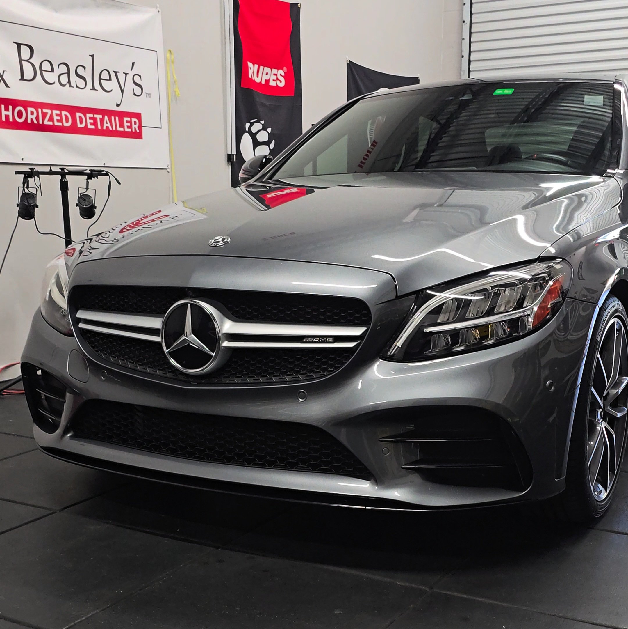 Silver Mercedes-Benz C300 AMG-Line sedan after a premium 7-year ceramic coating and paint correction service.