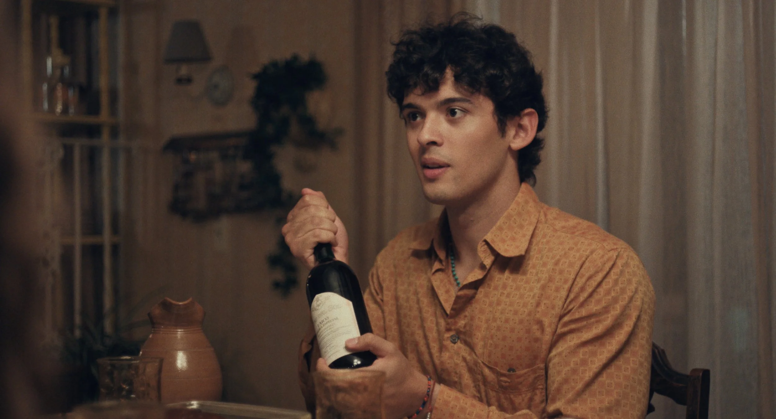 JJM - Alexandro Byrd offers wine.jpg