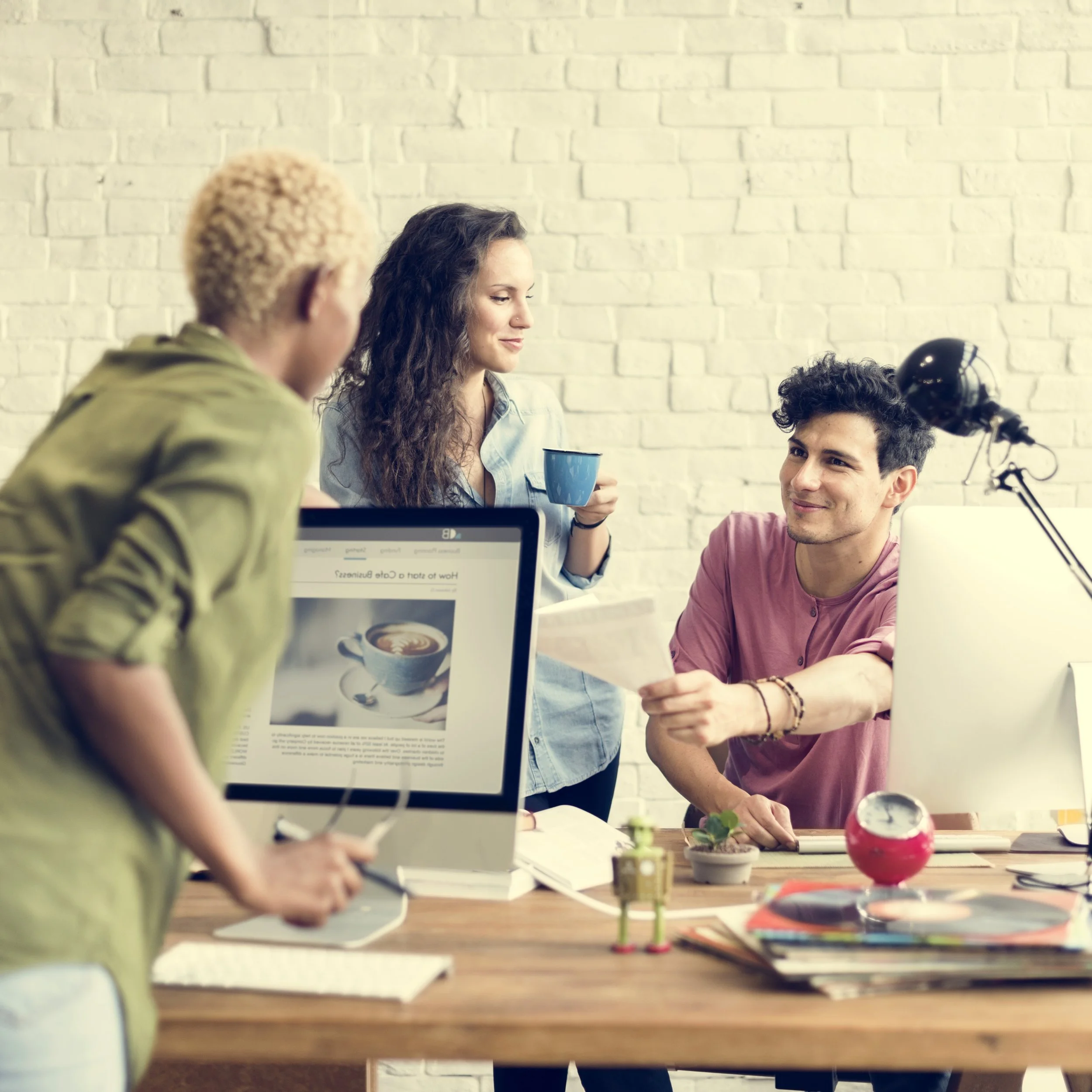 colleagues-working-together-in-a-bright-office-2026-01-07-23-22-27-utc.jpg