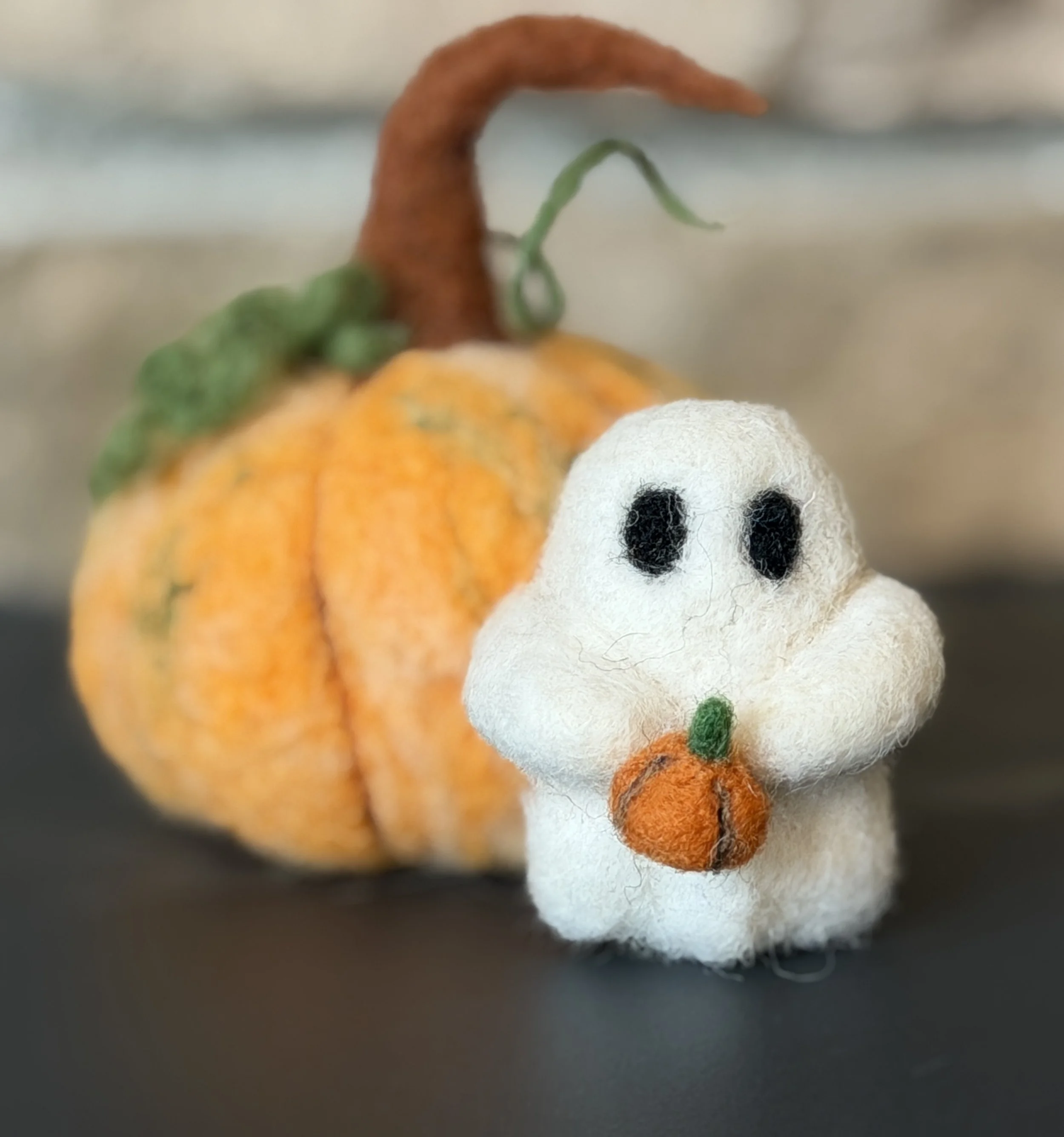 a photo of needle felted pumpkin 