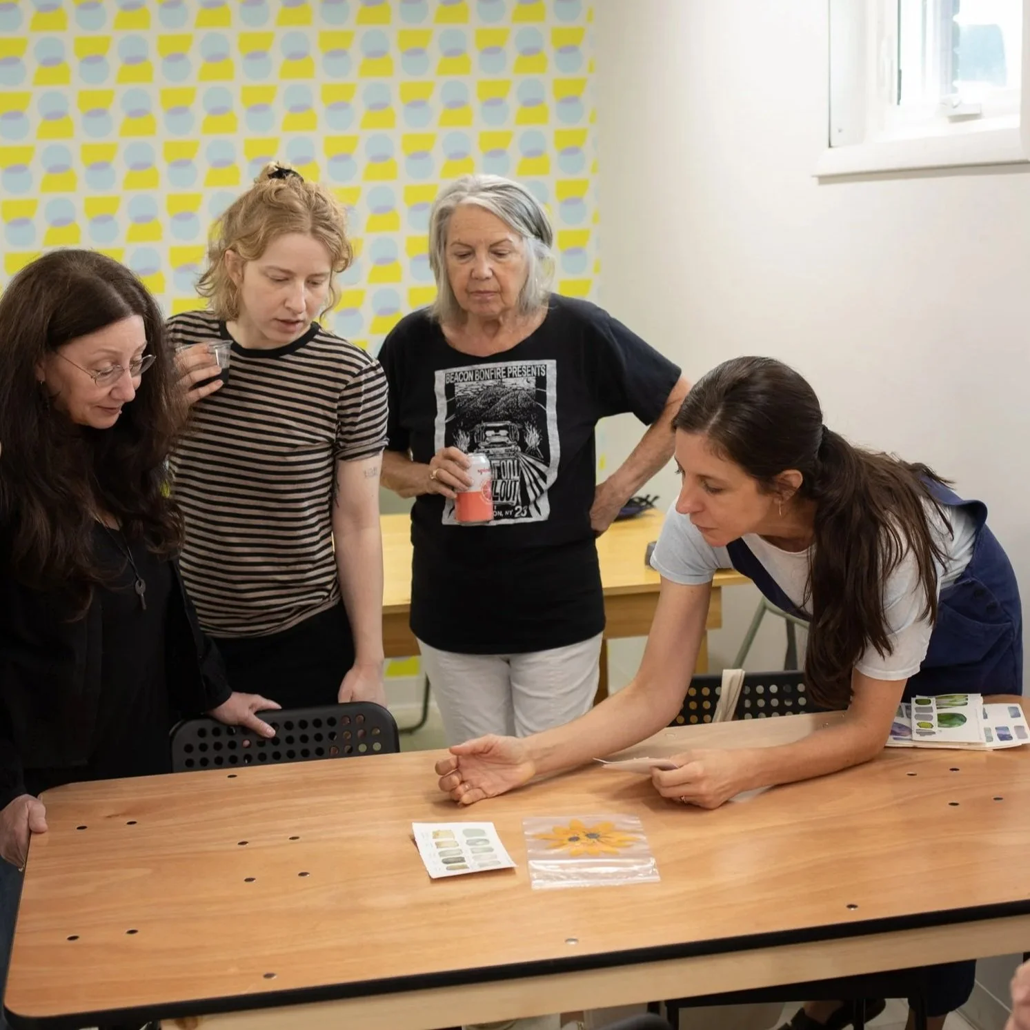 That Creative Space, teacher showing botanical ink process to three women students