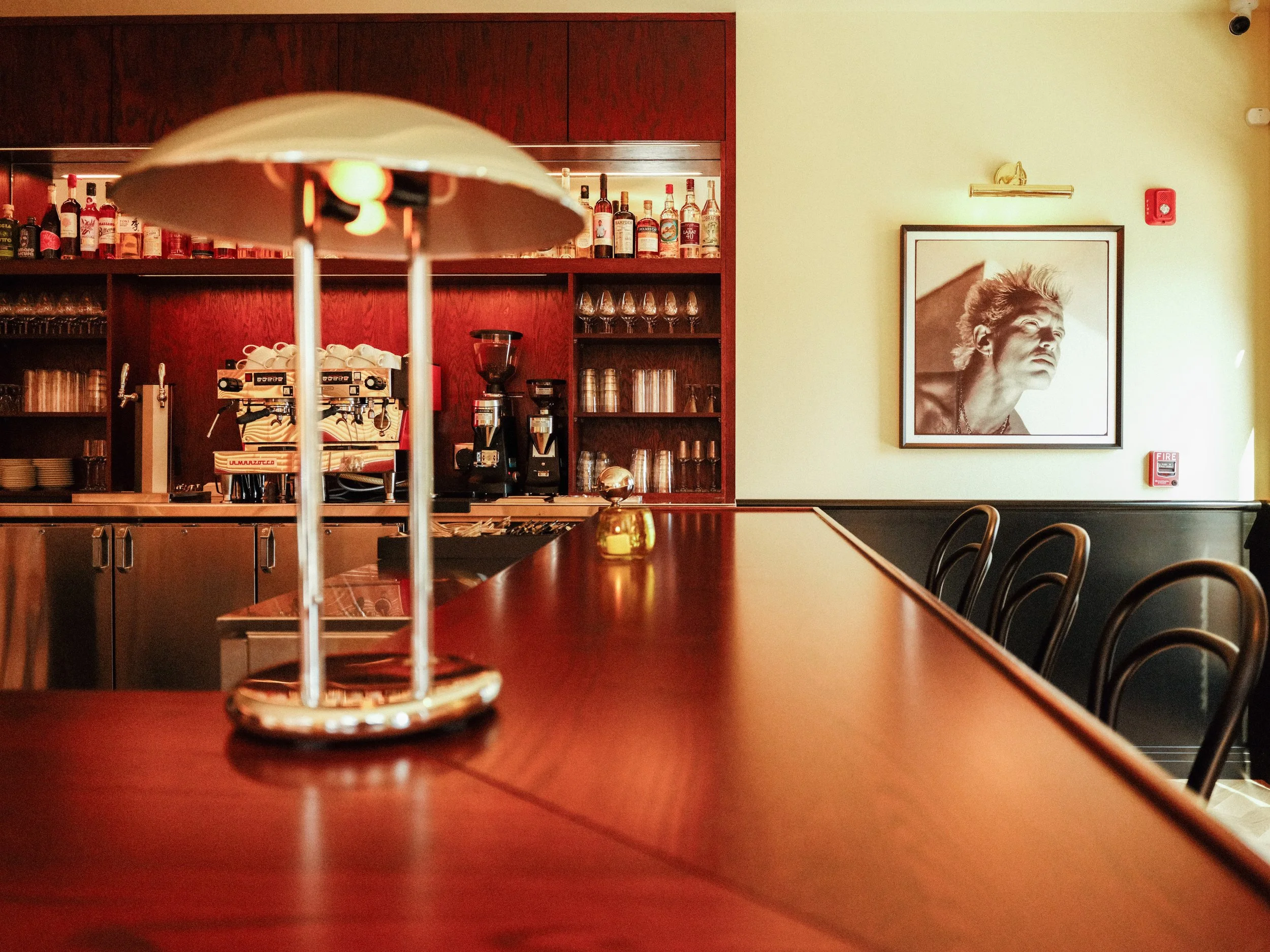 Cocktail bar at Junior Nashville with warm lighting