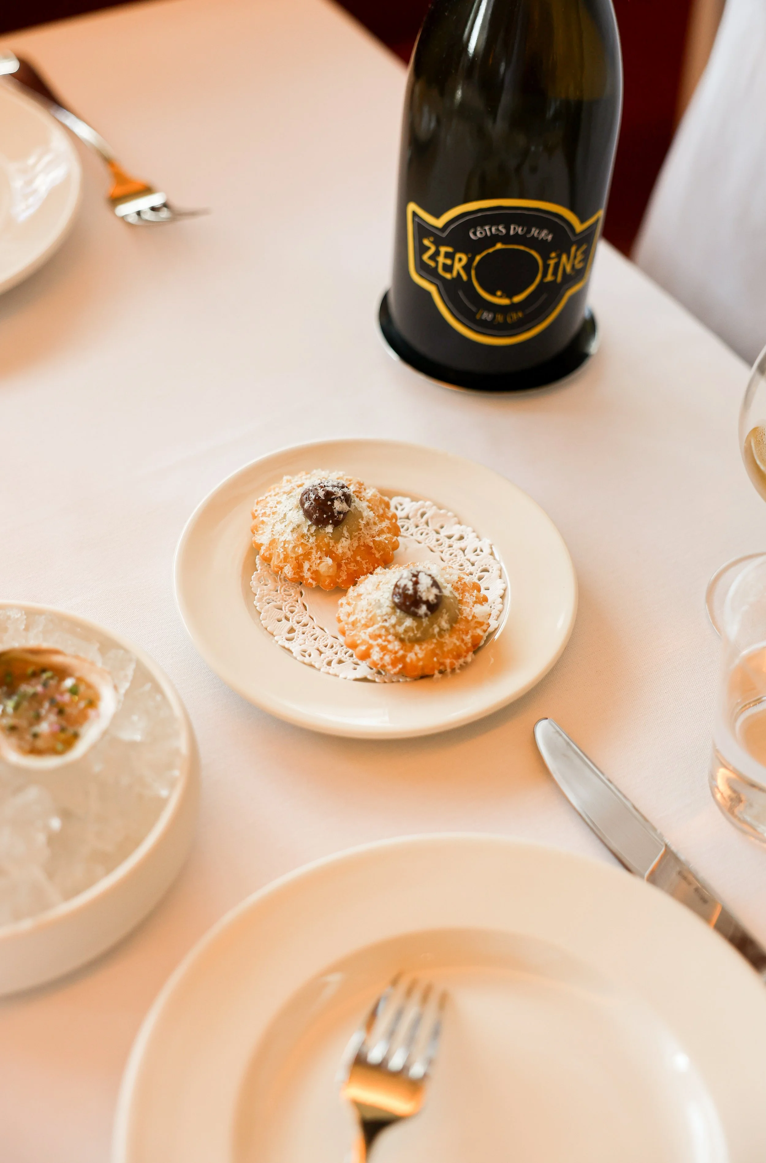 Shared plates and wine for group dining at a Nashville restaurant