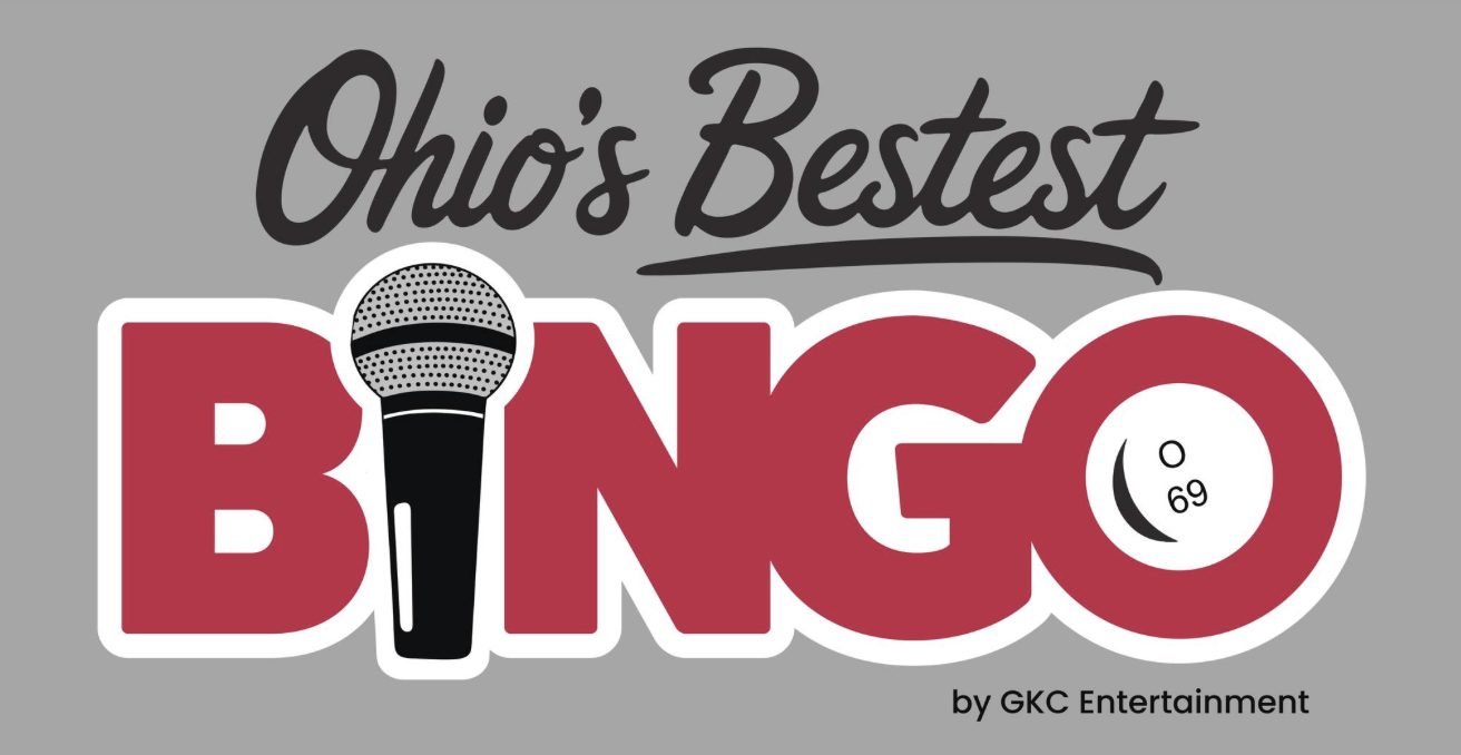 Close-up of numerous small, round, wooden bingo chips with red and white numbering on a surface.