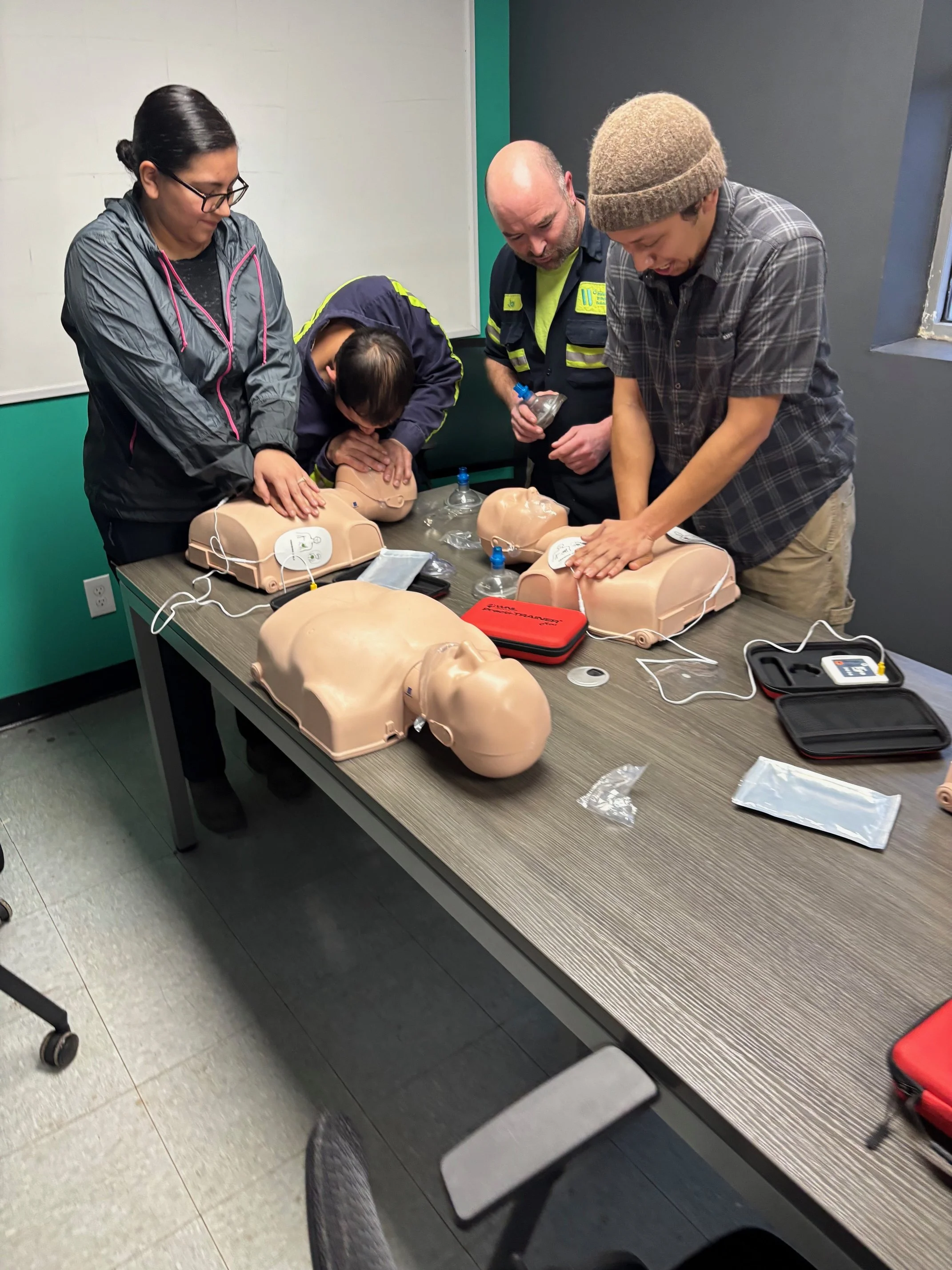 Manufacturing employees participating in private workplace CPR training provided by Ready Set Rescue Training