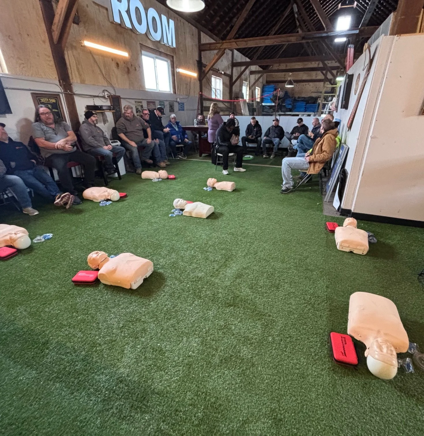 Manufacturing employees participating in private workplace CPR training provided by Ready Set Rescue Training