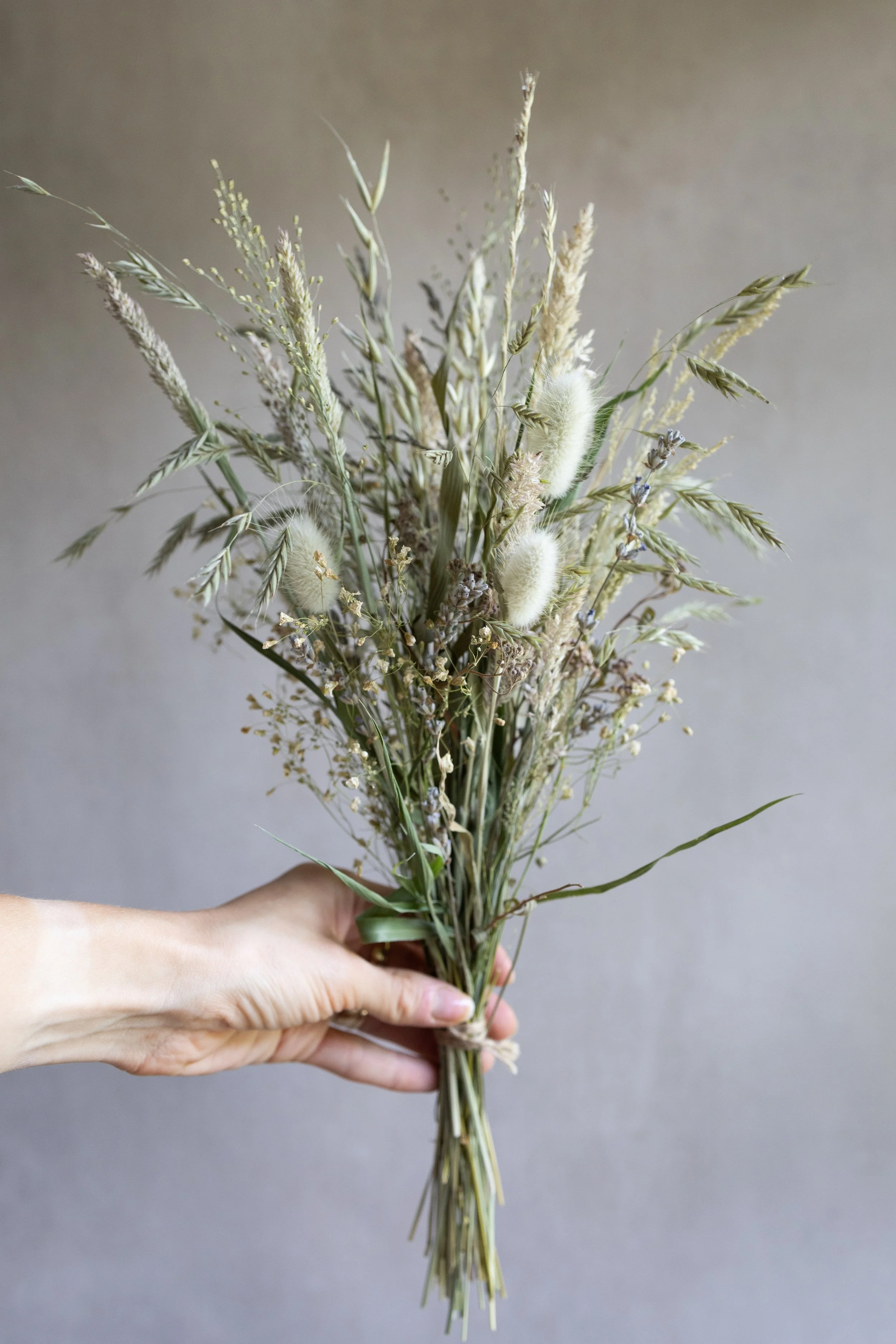 Small bouquet with hand.jpg