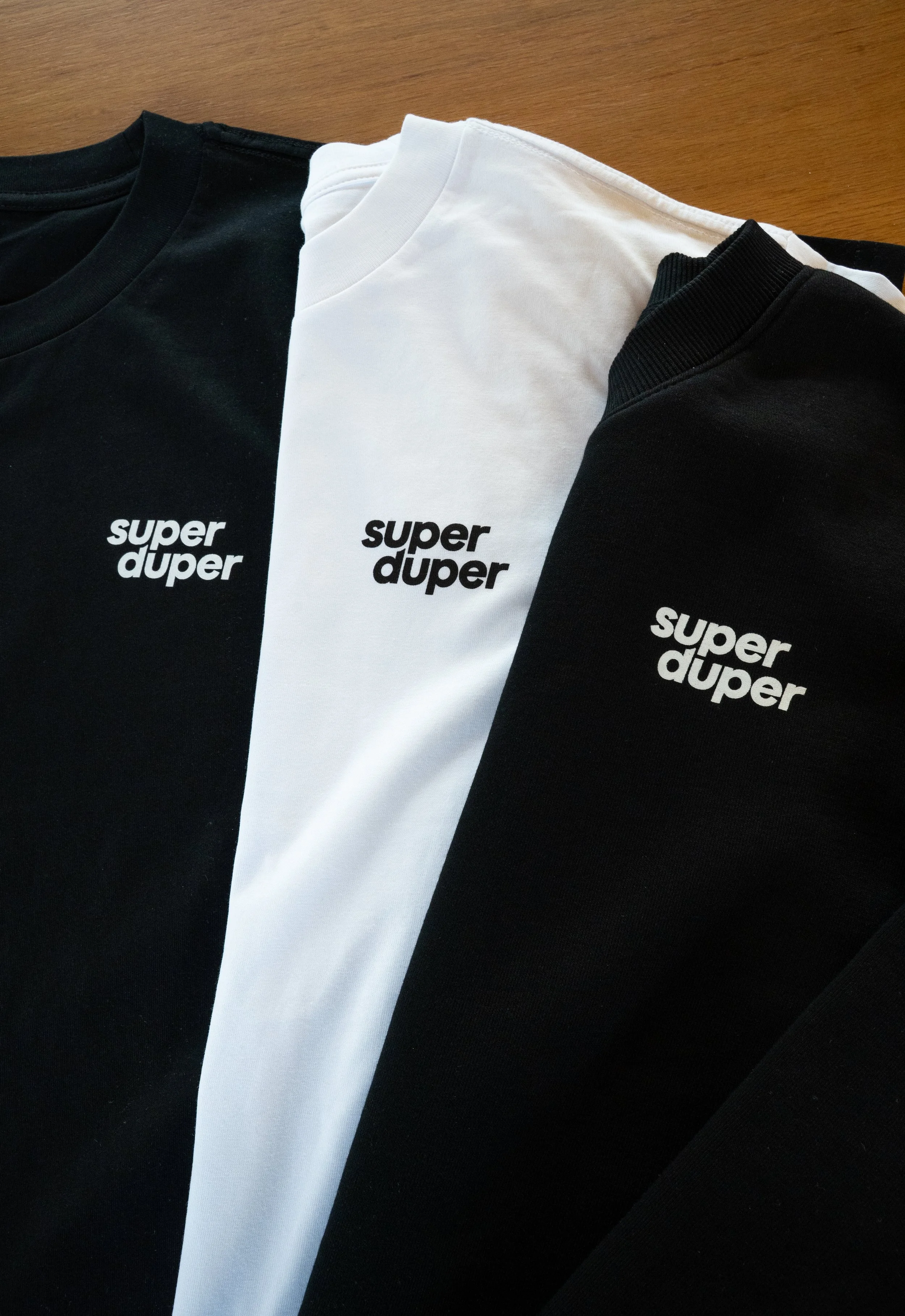 Screen printed tees and crews for Super Duper