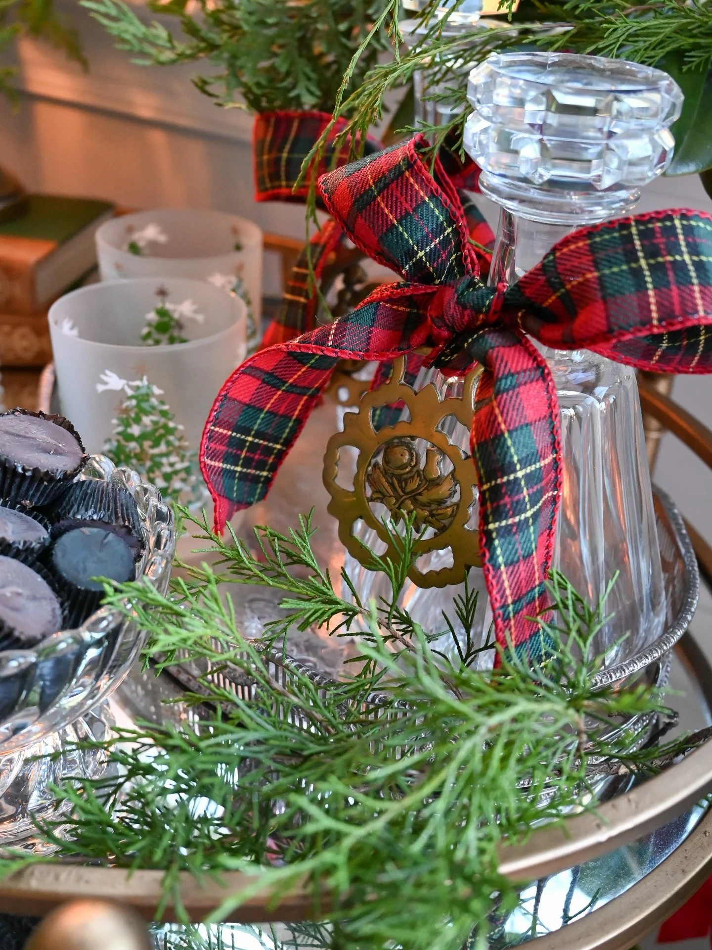 A small detail, but one I keep noticing.
A vintage horse brass repurposed as a tag on a crystal decanter, sitting quietly on the bar cart.

It still feels like Christmas to me (it is only the fourth day of Christmas, after all) and I&rsquo;m letting 