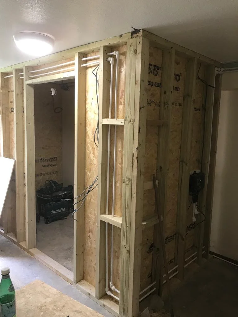 Timber framing with plywood installed. Ready for insulation. Bathroom timber frame.