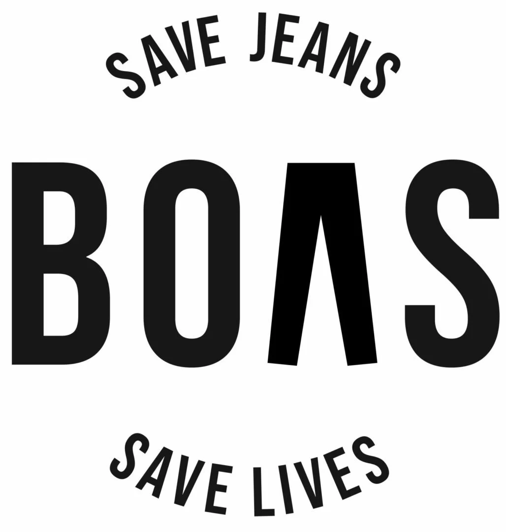 Text-based graphic with the message 'Save Jeans, Save Lives' in bold black letters, promoting the idea that saving jeans can save lives.