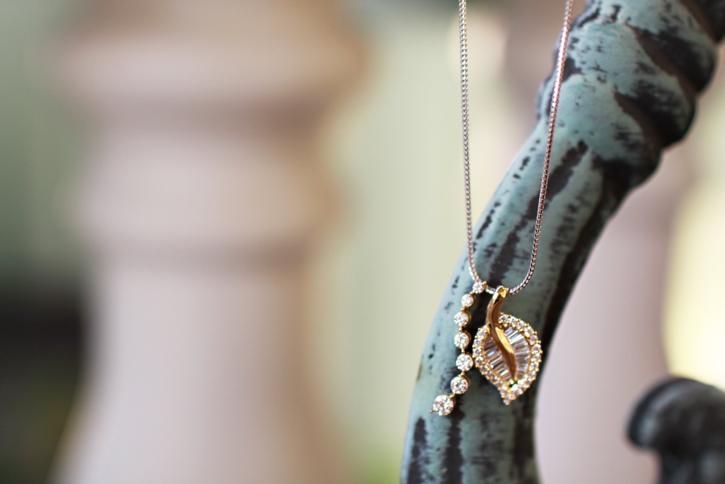 A landscape with multiple wind turbines in a desert area under a blue sky with scattered clouds.