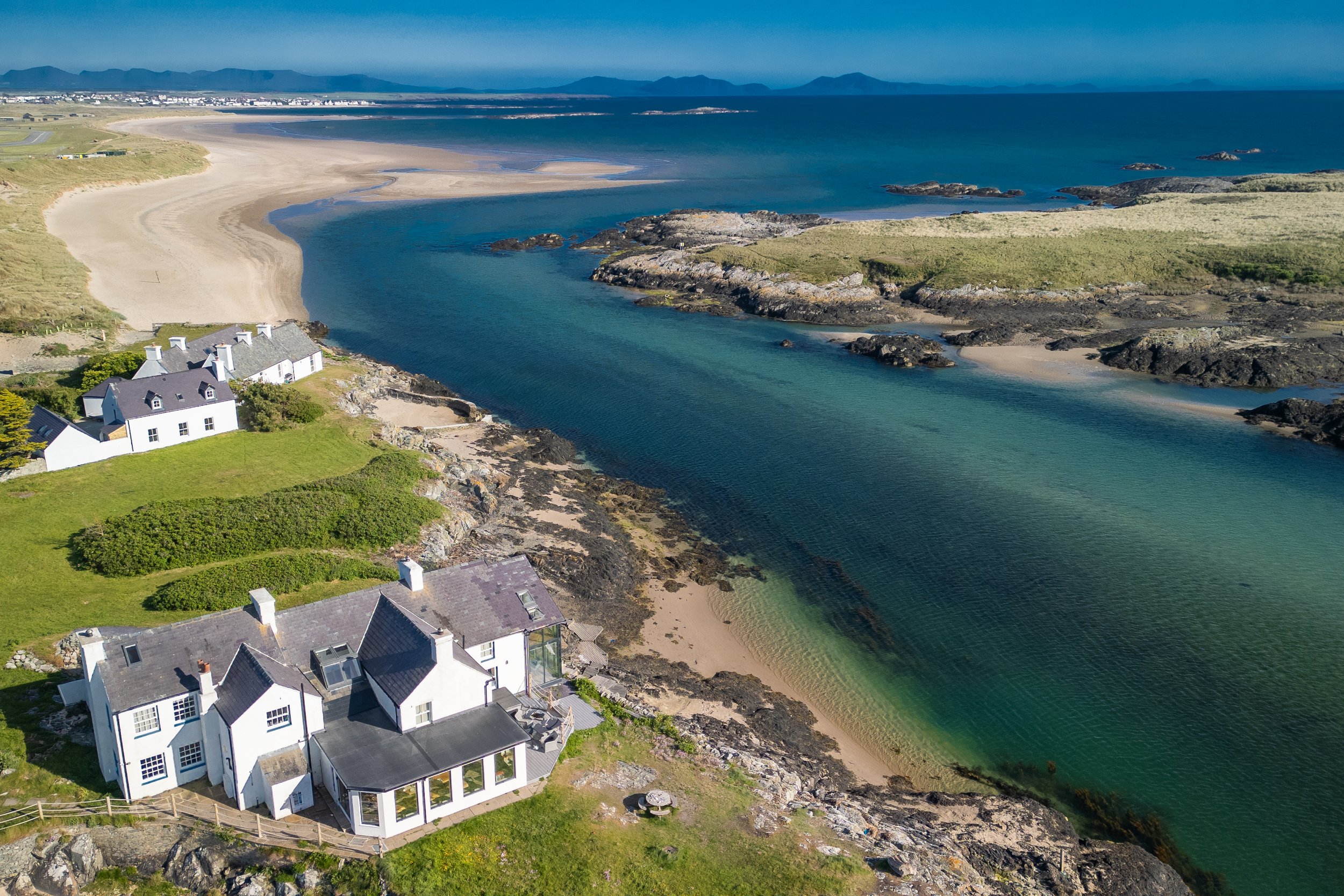 Aerial drone photography of luxury coastal estate and scenic sea view property