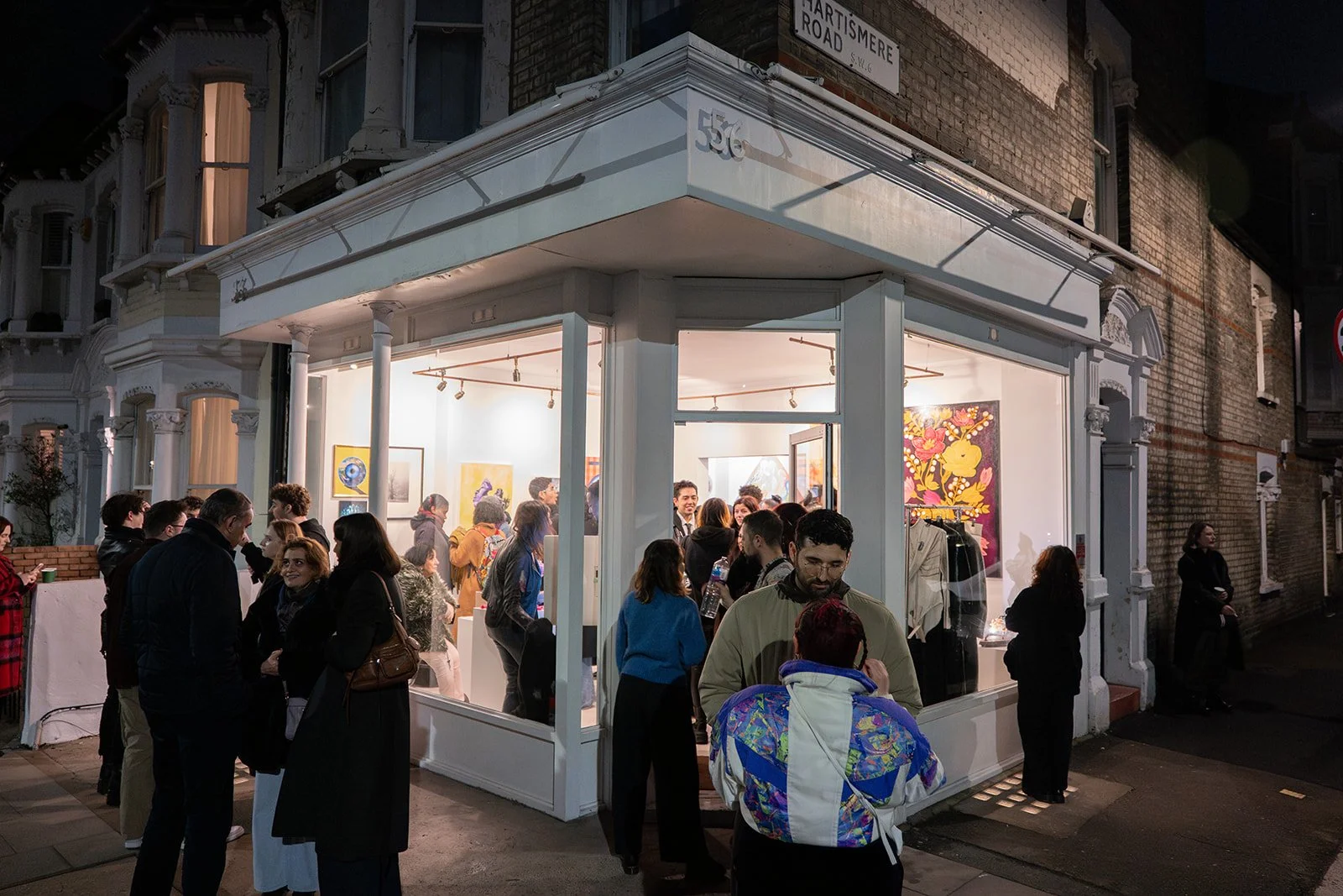 Arrival Gallery previous exhibition wall and opening night in London