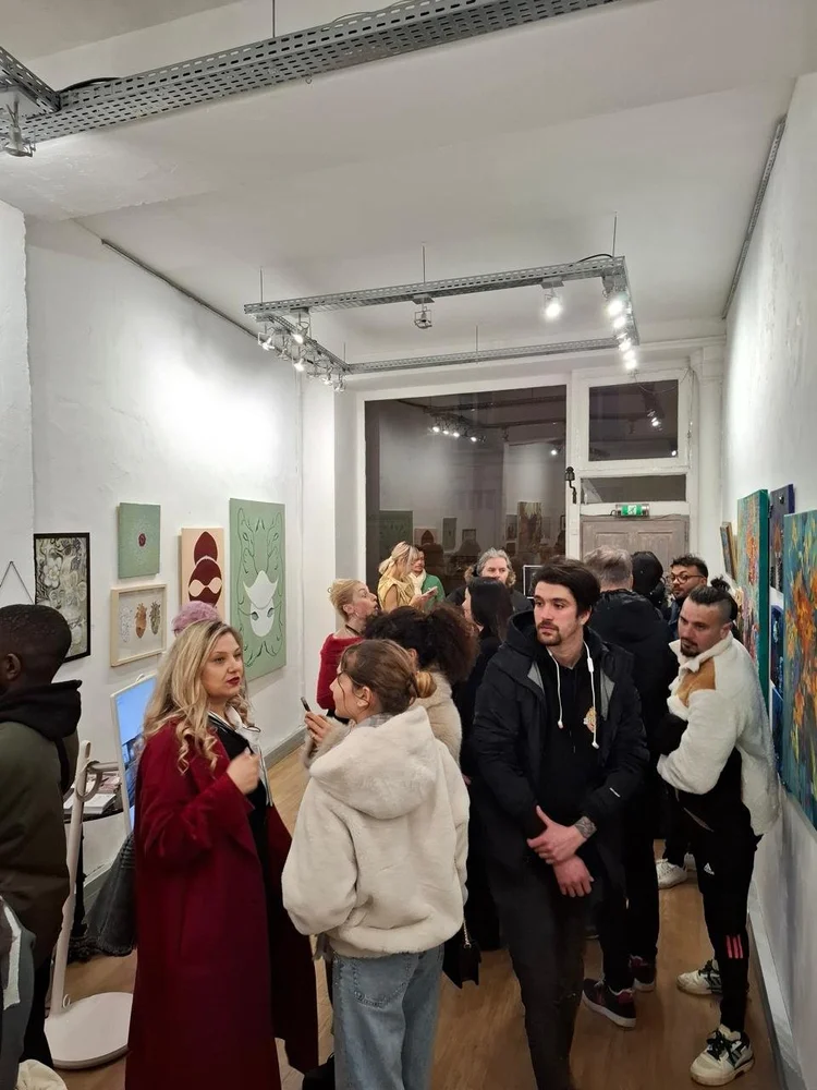 Artists, visitors, and opening moments at Arrival Gallery