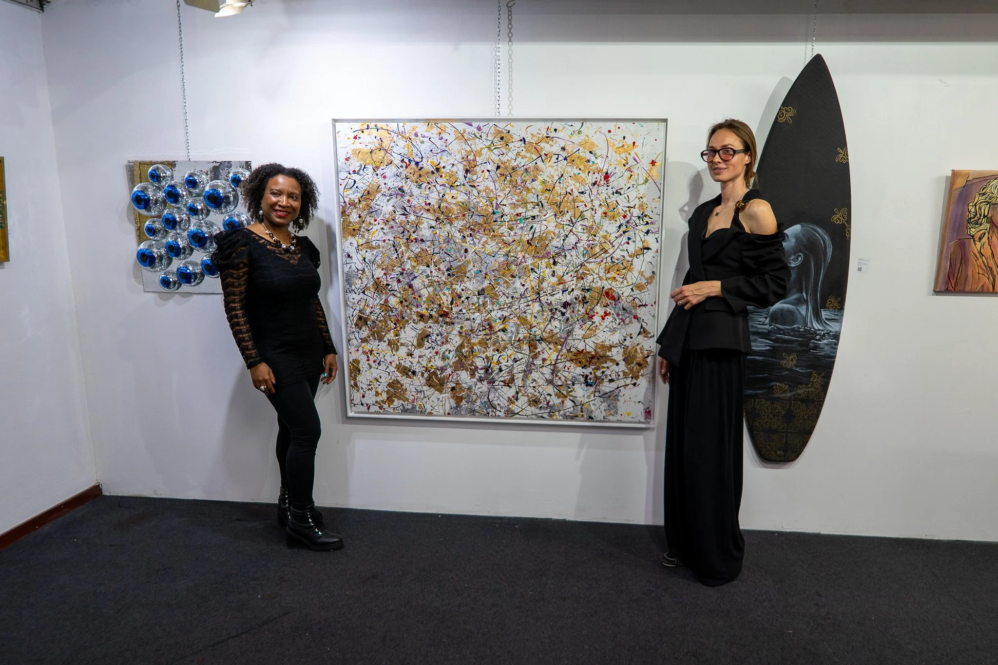 Visitors at an Arrival Gallery Lisbon exhibition opening