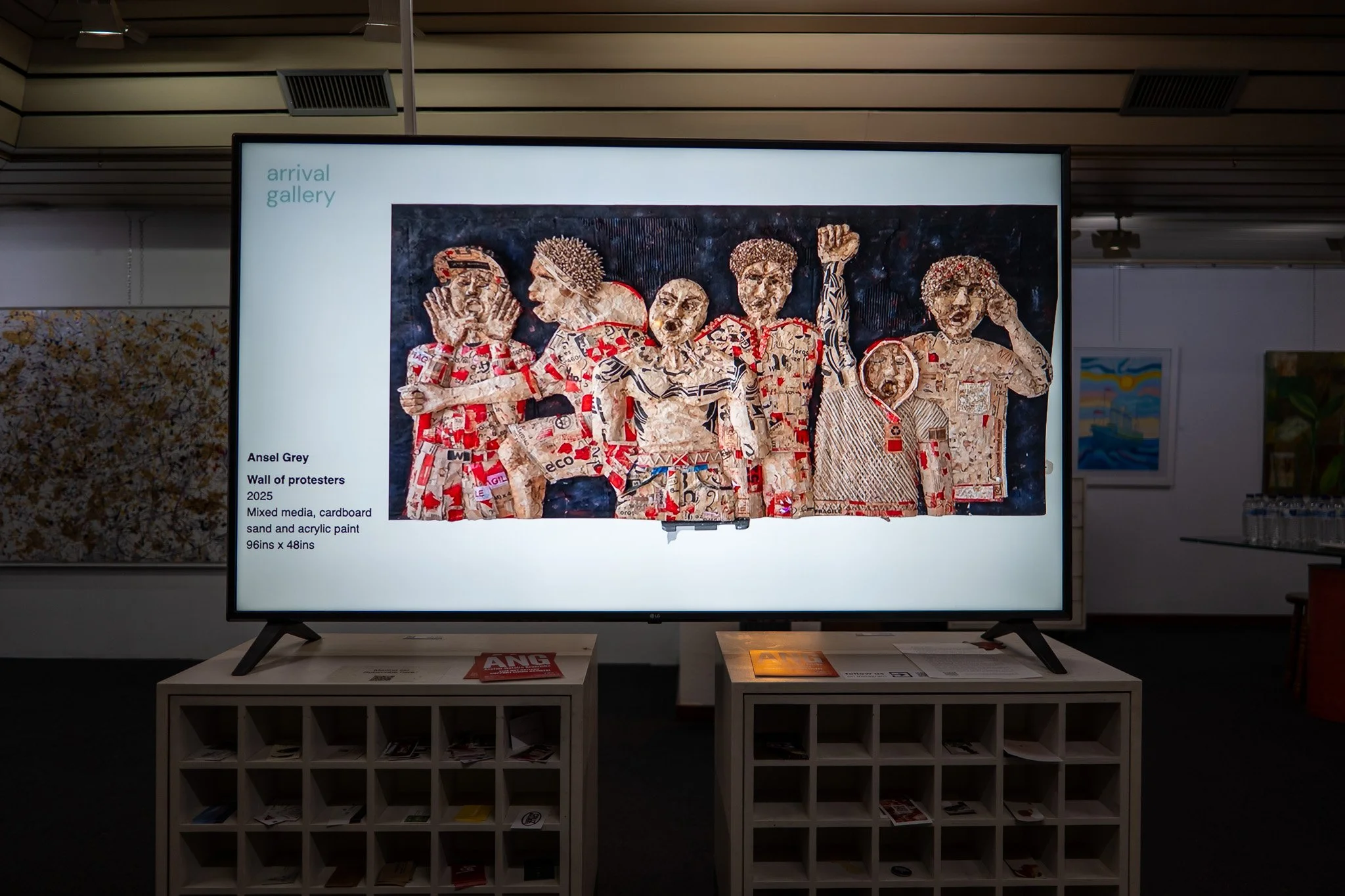 Arrival Gallery photography showcase on digital screen