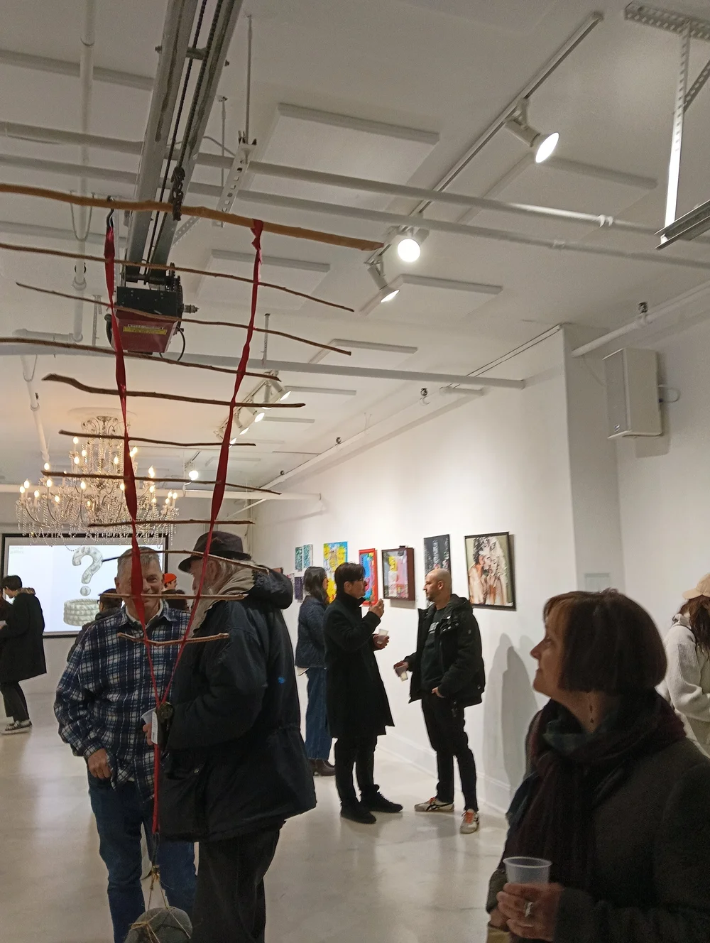 Visitors at an Arrival Gallery New York exhibition