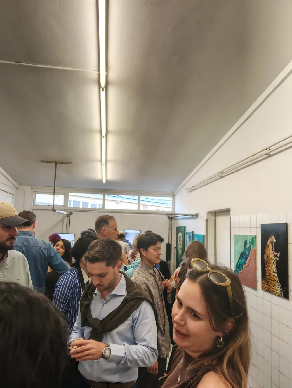 Visitors at an Arrival Gallery Amsterdam exhibition opening