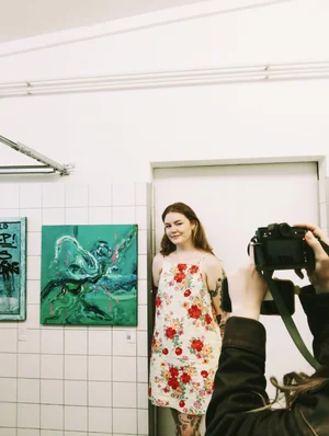 Arrival Gallery photography showcase on digital screen