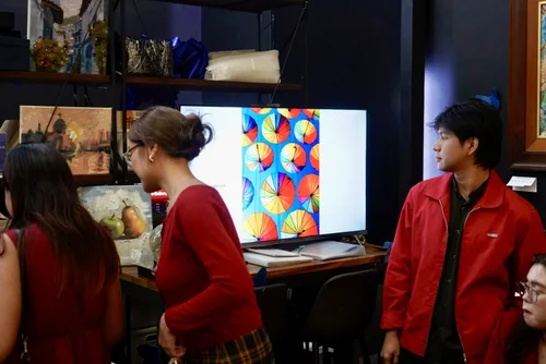 Arrival Gallery photography showcase on digital screen