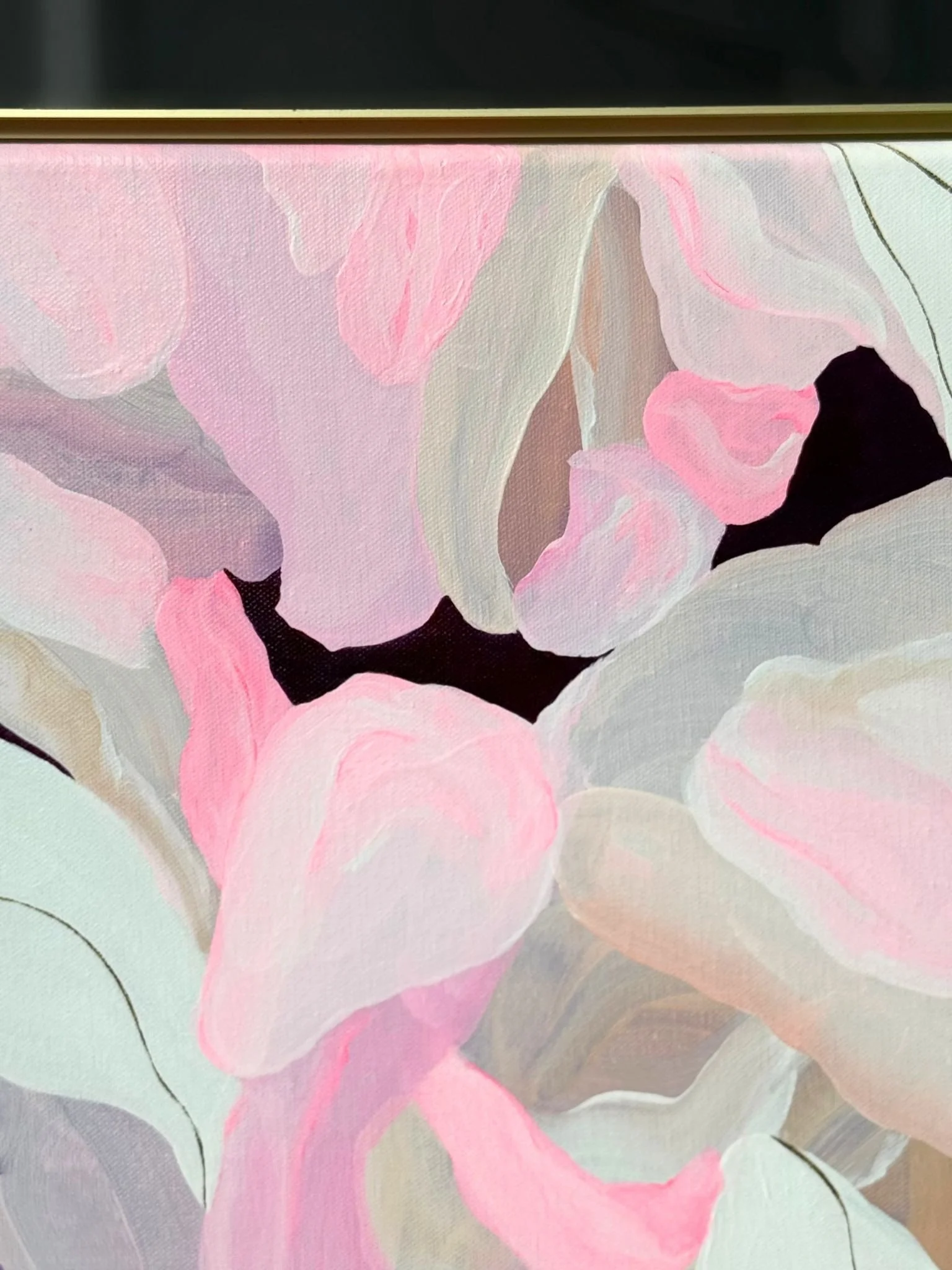 A top detail of Where the Petals Land—petal‑like forms drifting toward the gold frame.