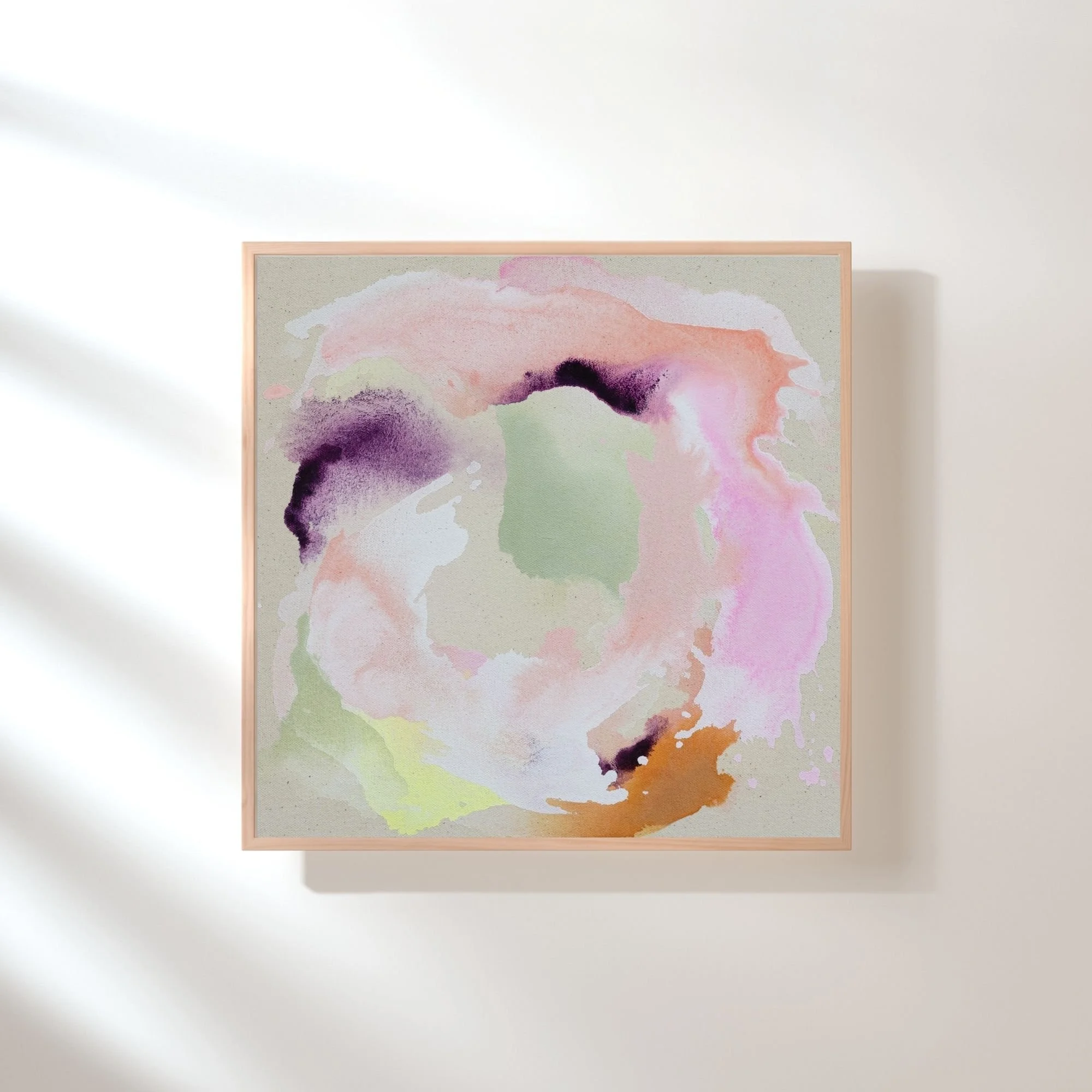 Rainbow Carousel abstract painting in fluid acrylic and acrylic inks—mint, peach and lavender—shown alone on a wall with soft natural light from a nearby window.