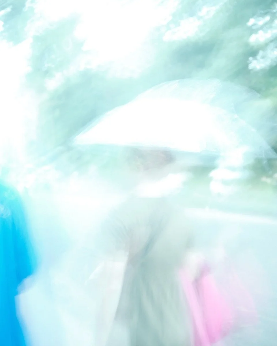 「空に浮かぶ街で」雨の婦人