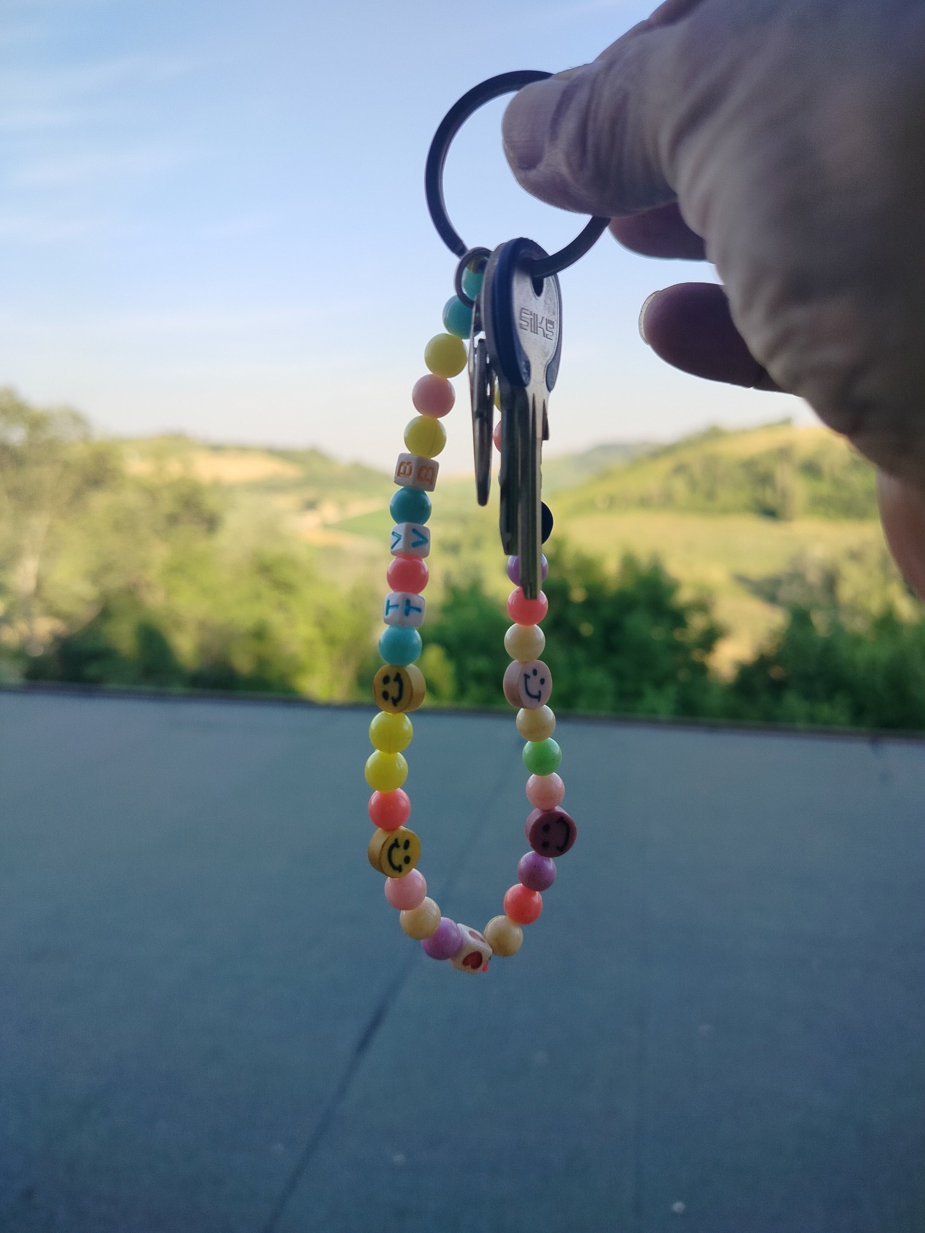Keys to a countryside home with panoramic views in Le Marche, Italy.