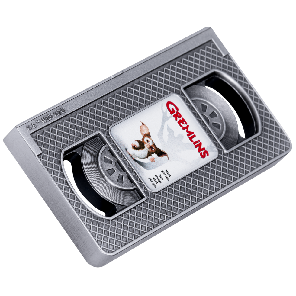 A vintage cassette tape with front labels featuring the movie 'The Goonies' and a colorful illustrated scene from the film.