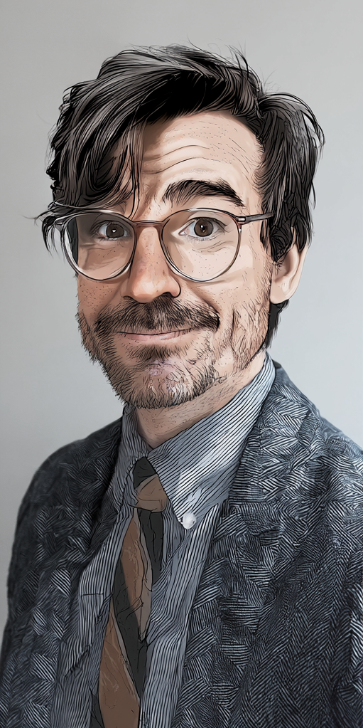 A man with glasses, dark hair, and a beard, smiling. He is wearing a patterned suit, a striped shirt, and a brown tie, standing against a plain background.